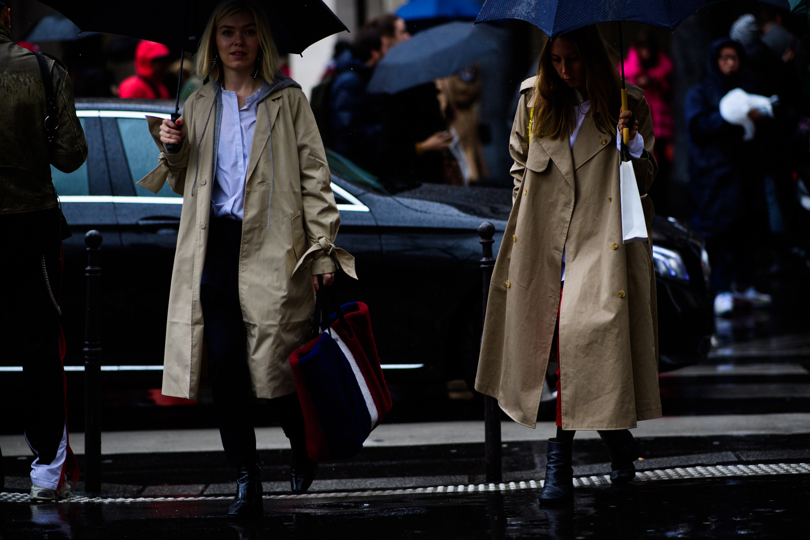 Two women in long beige coats