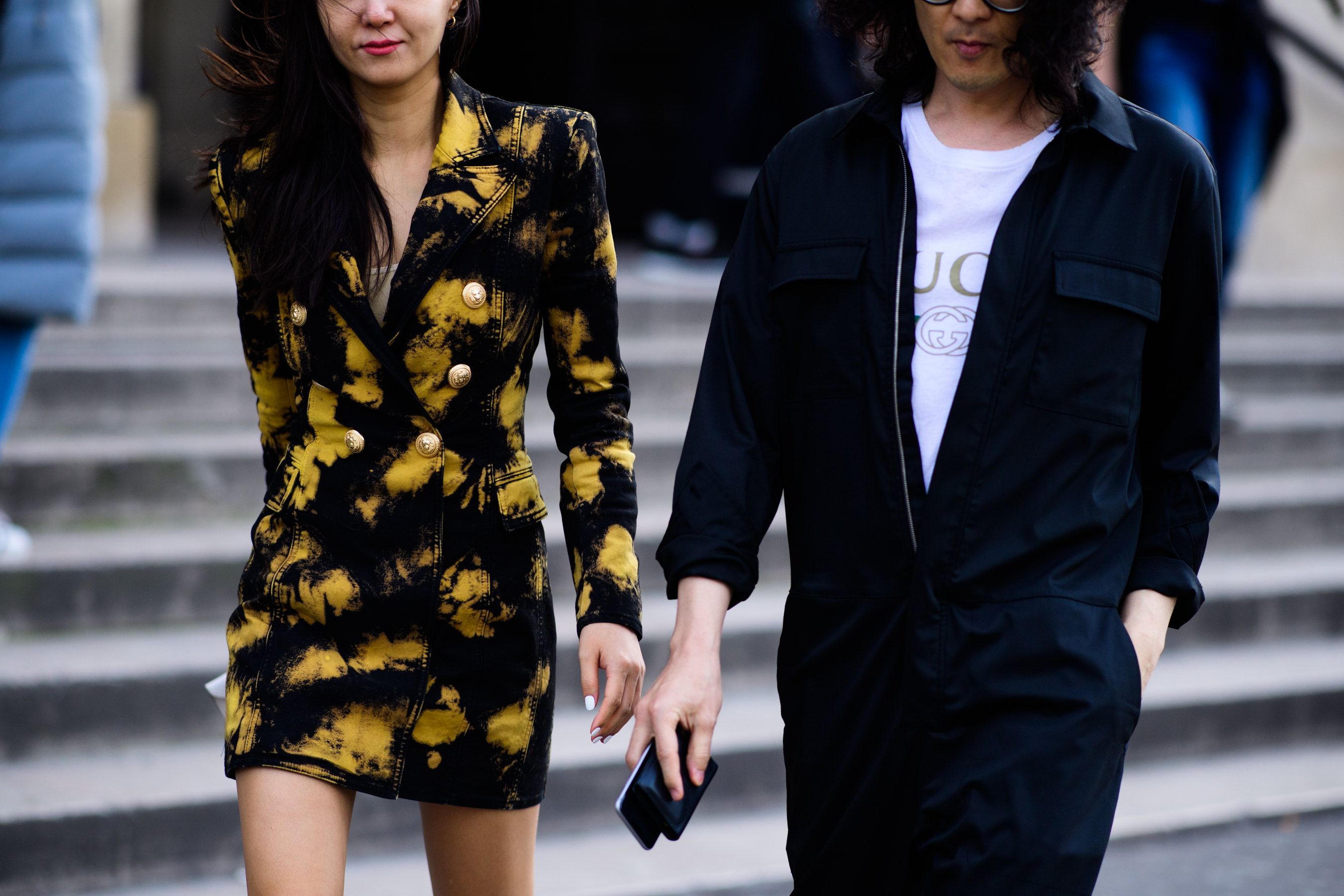 Man and woman wearing blazer dress