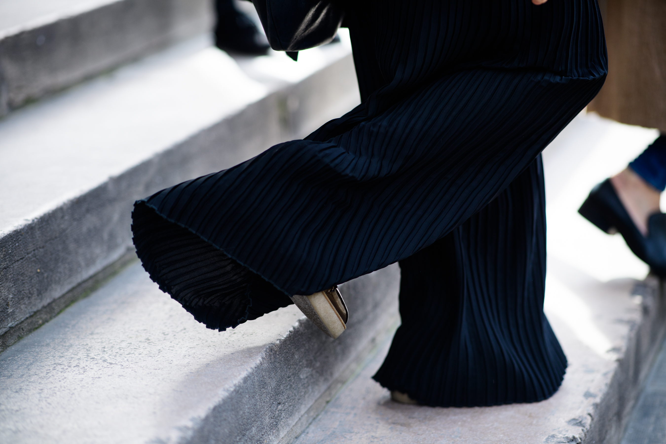 Woman wearing black pants