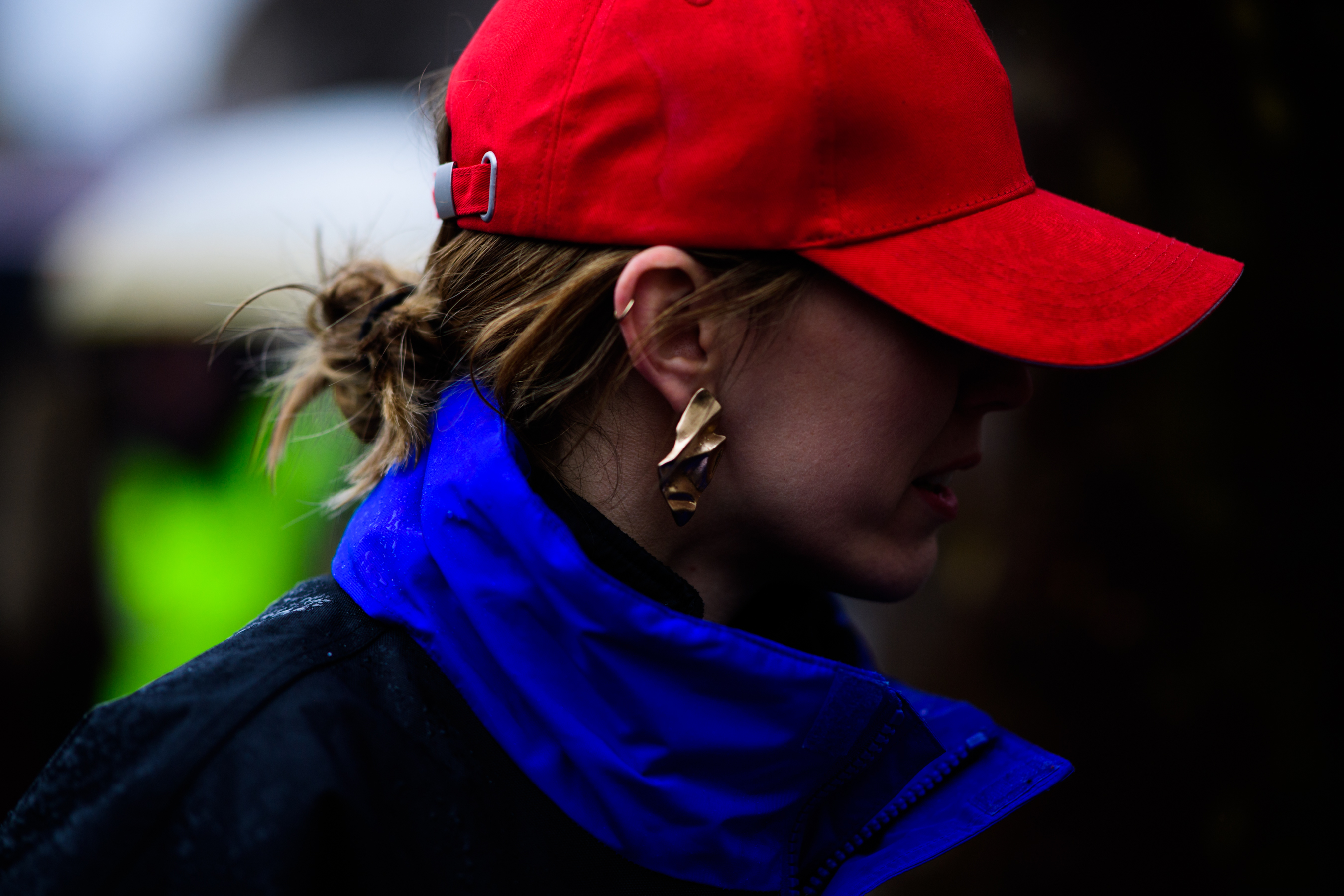 Woman wearing red baseball hat