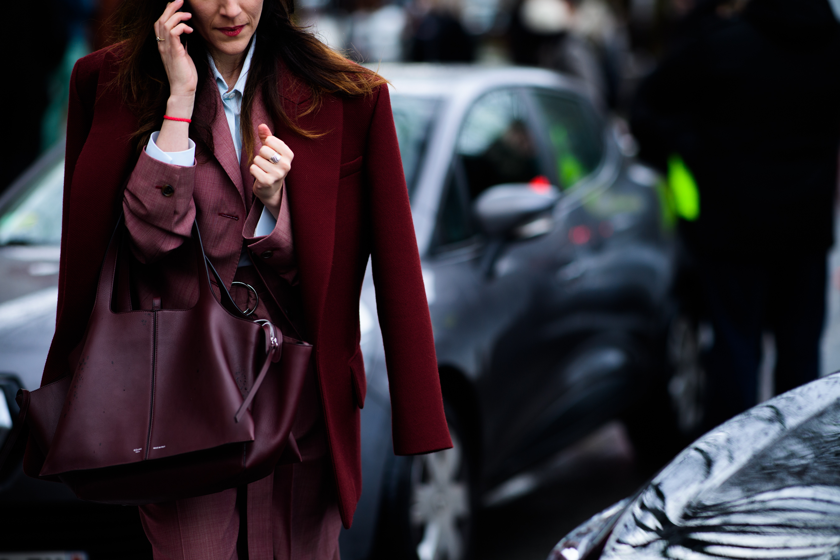 Woman wearing burgundy colour outfit