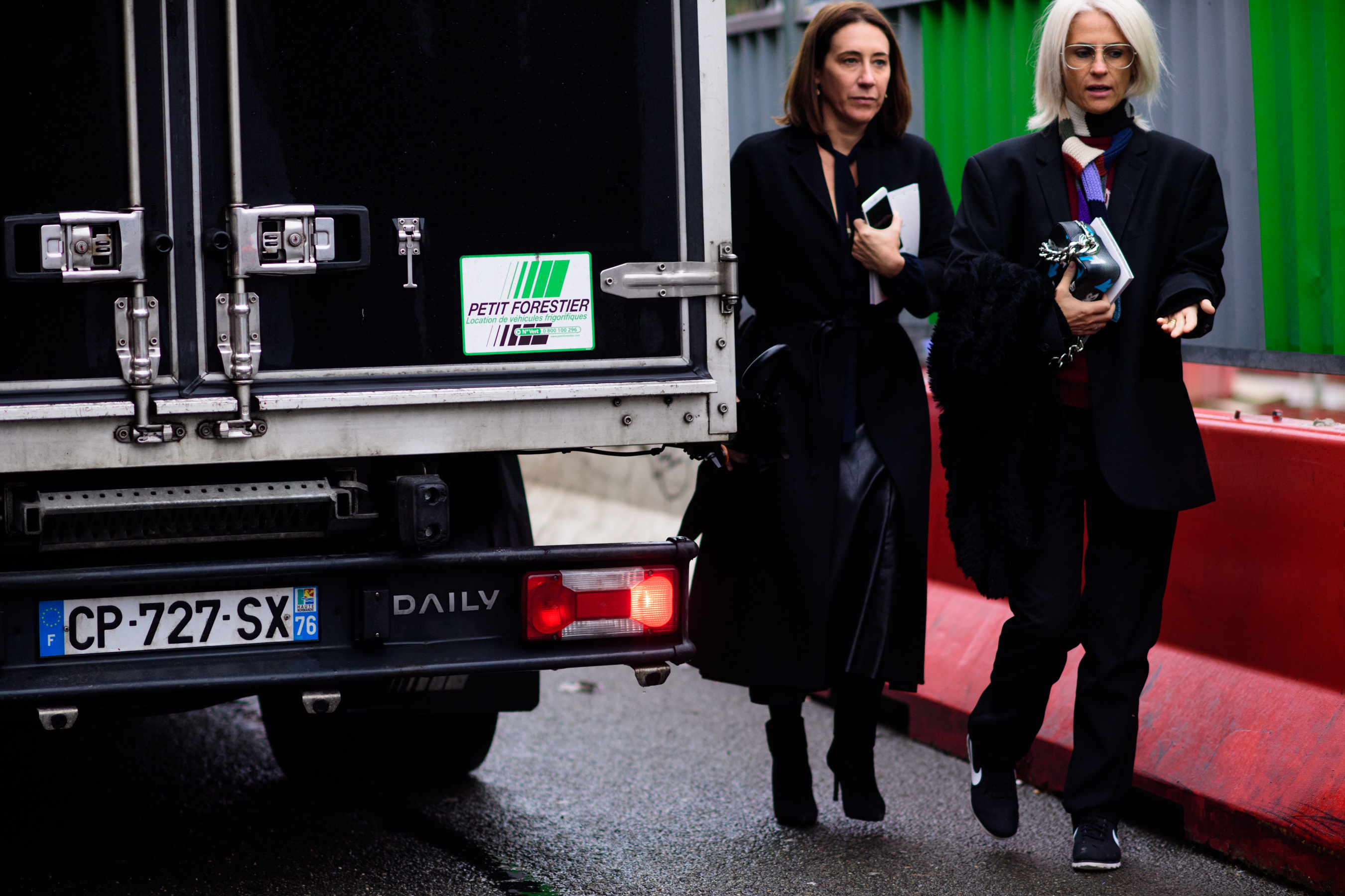 Two women wearing all black