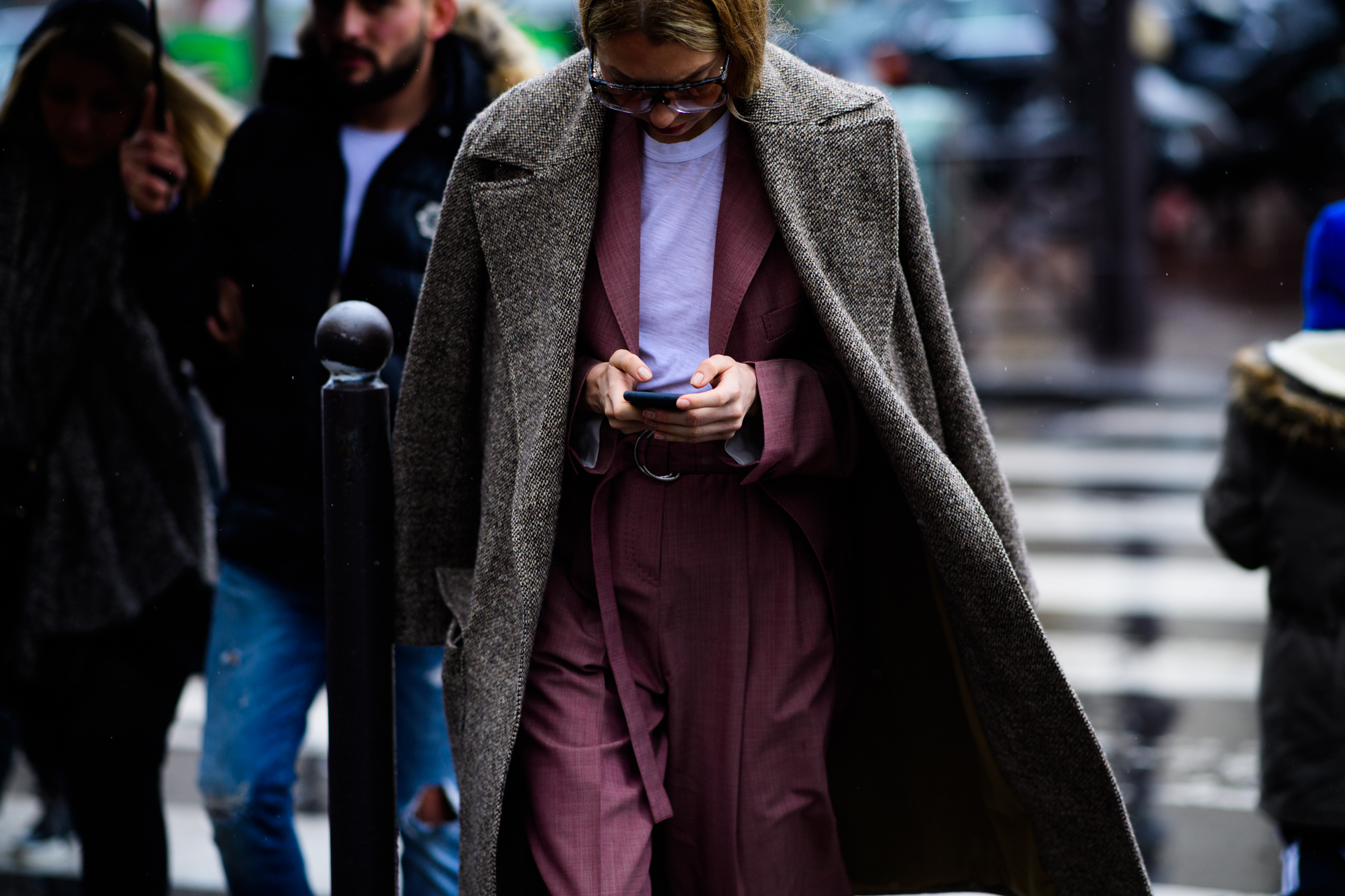 Woman wearing long gray coat