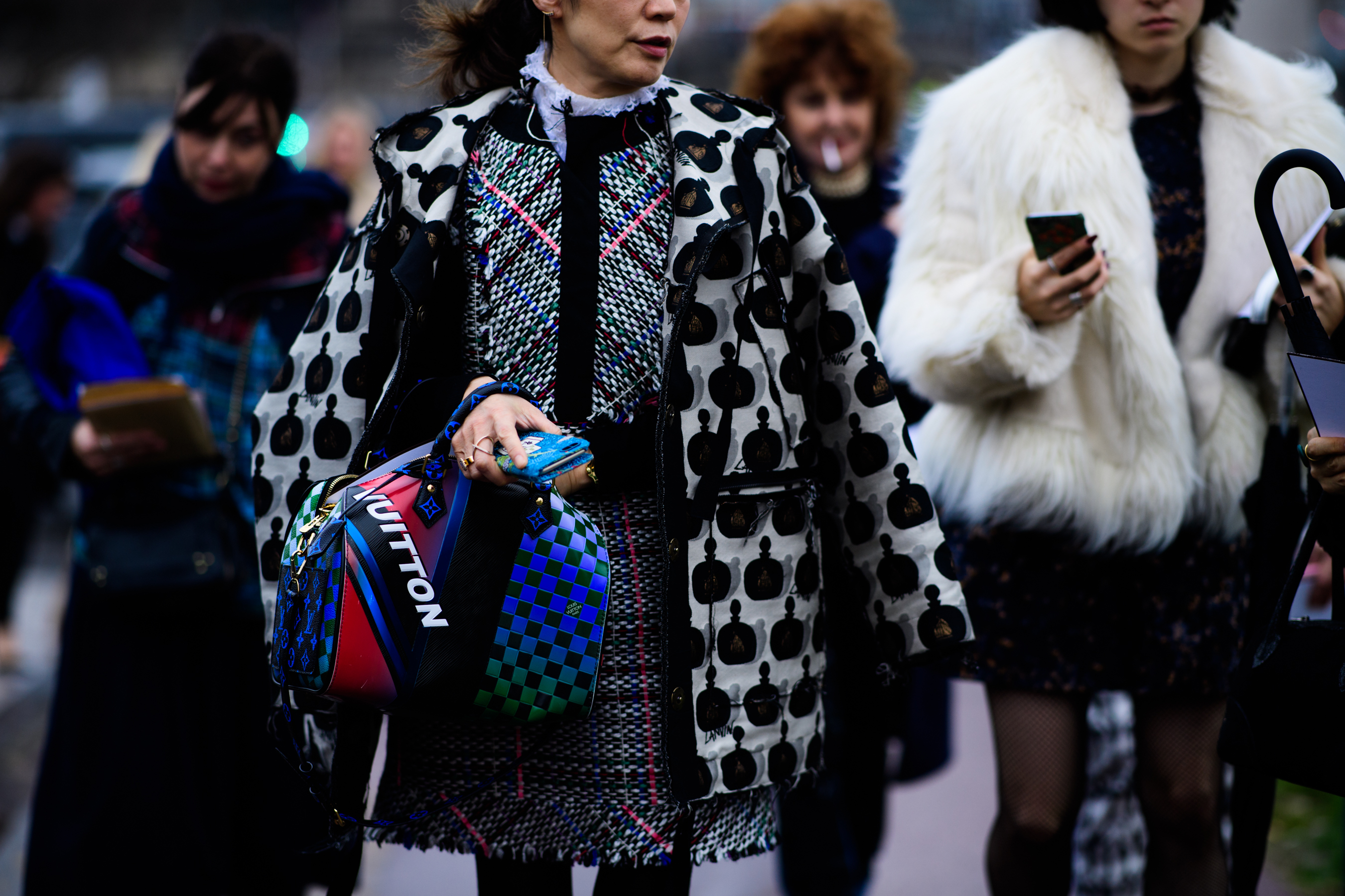 Woman with Louis Vuitton bag