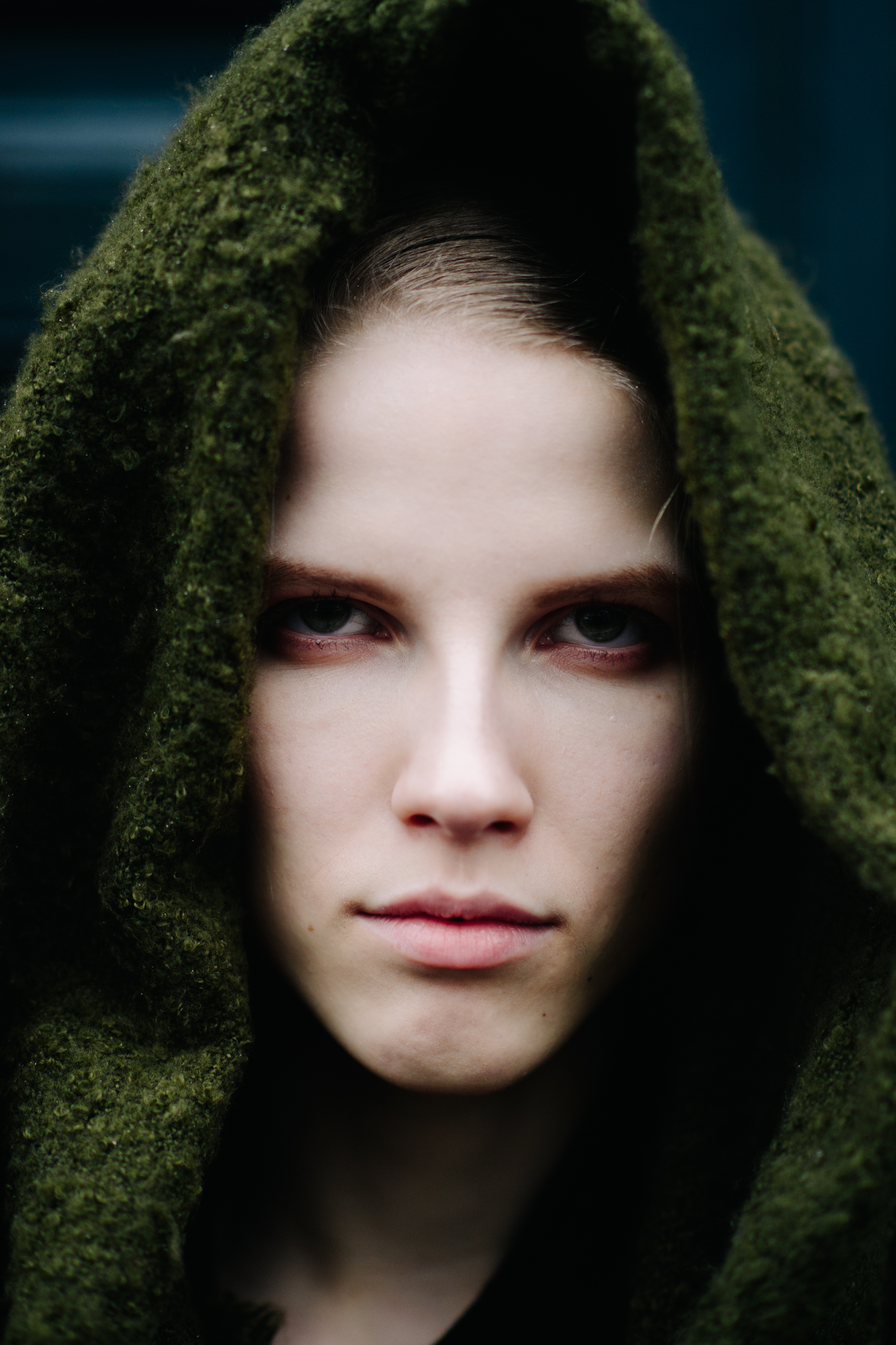 Portrait of a model wearing green scarf