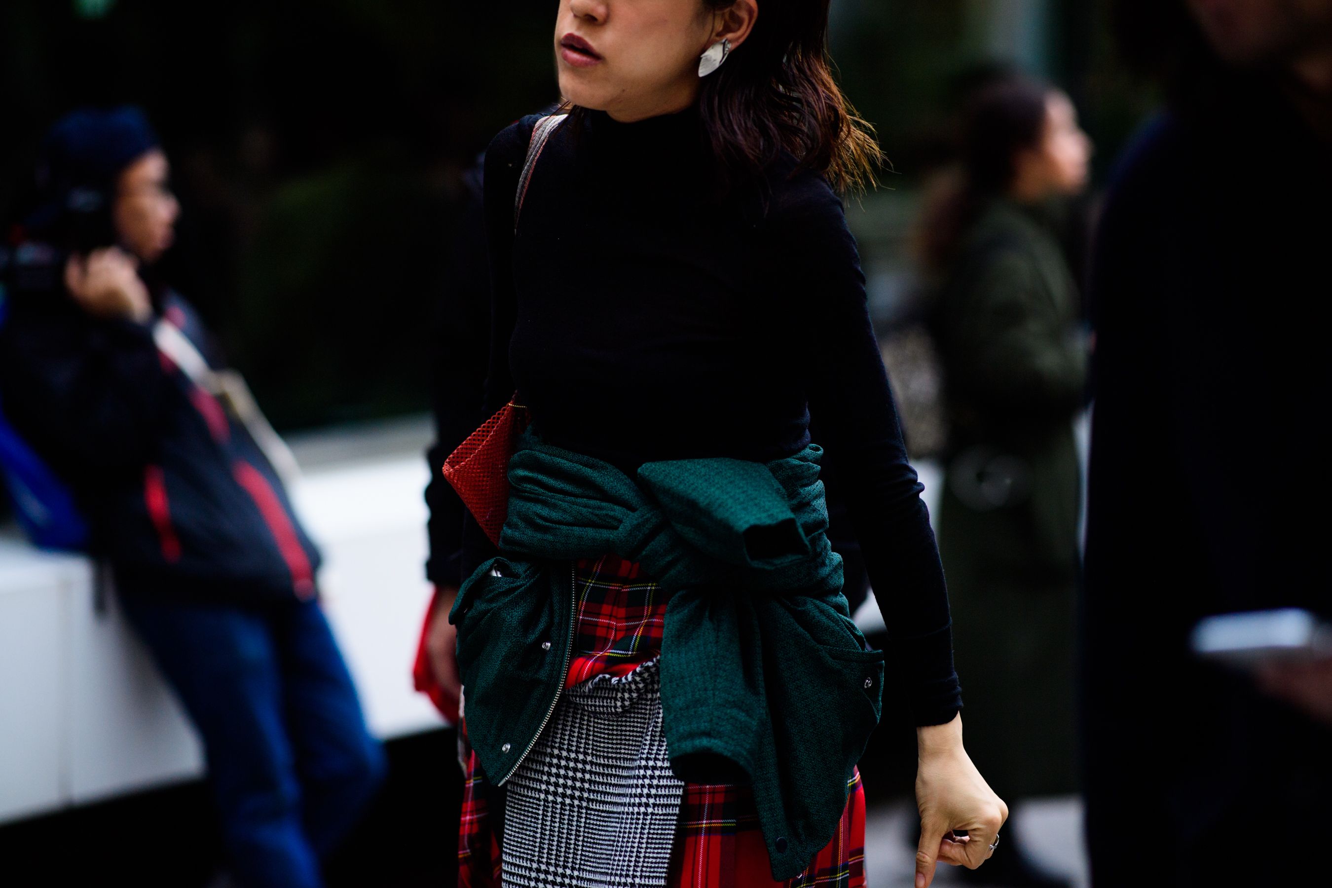 Woman wearing tartan skirt