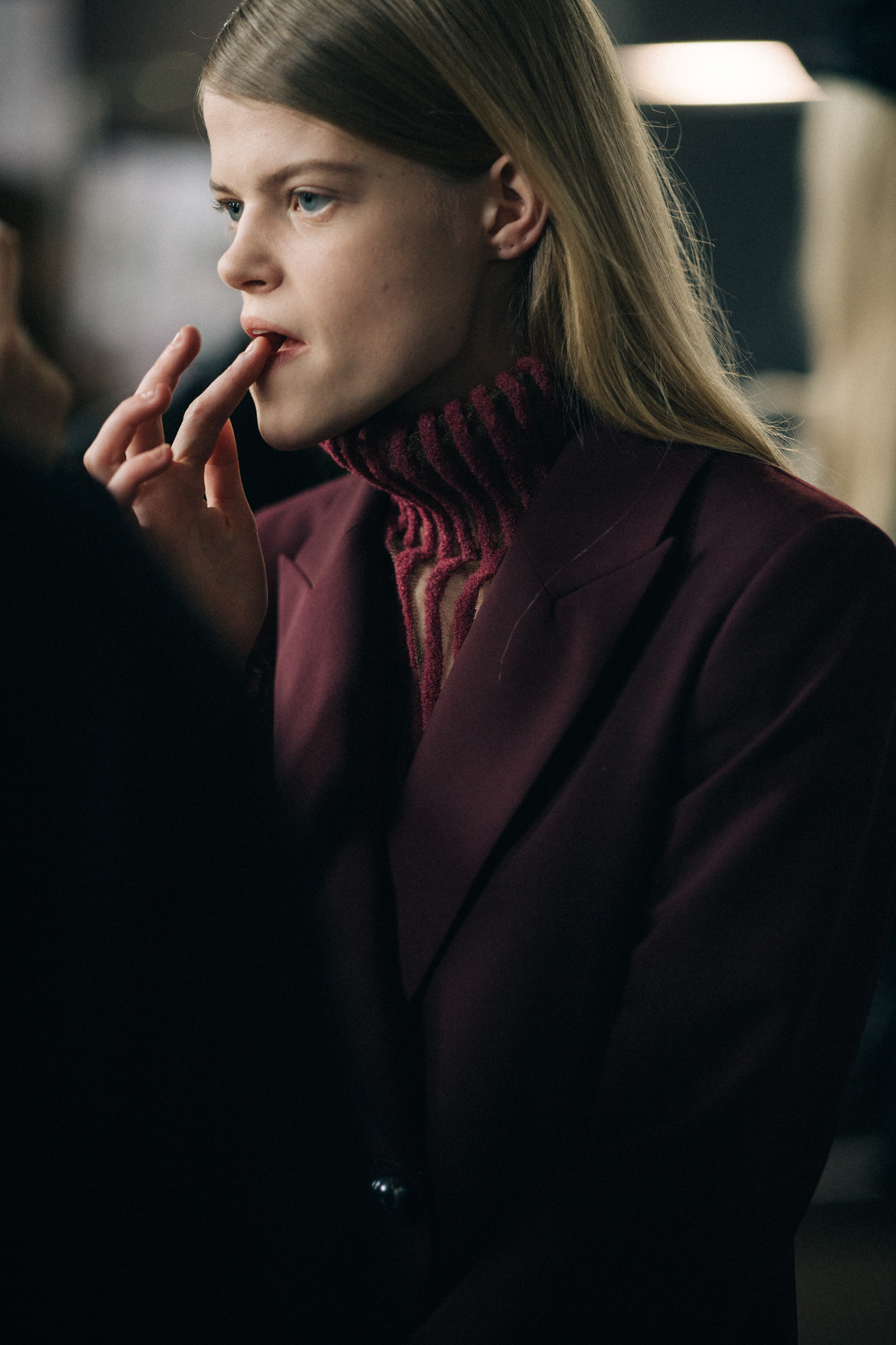 Dais Huisman wearing burgundy suit