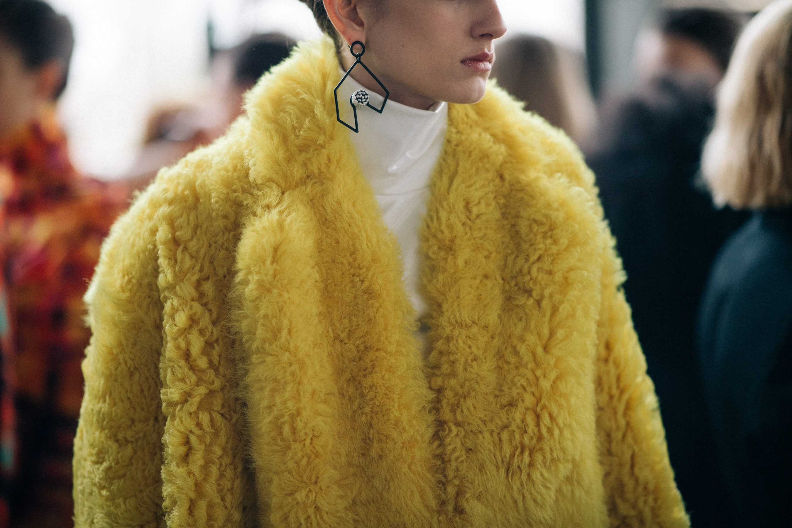 Model Sarah Berger wearing yellow fur coat