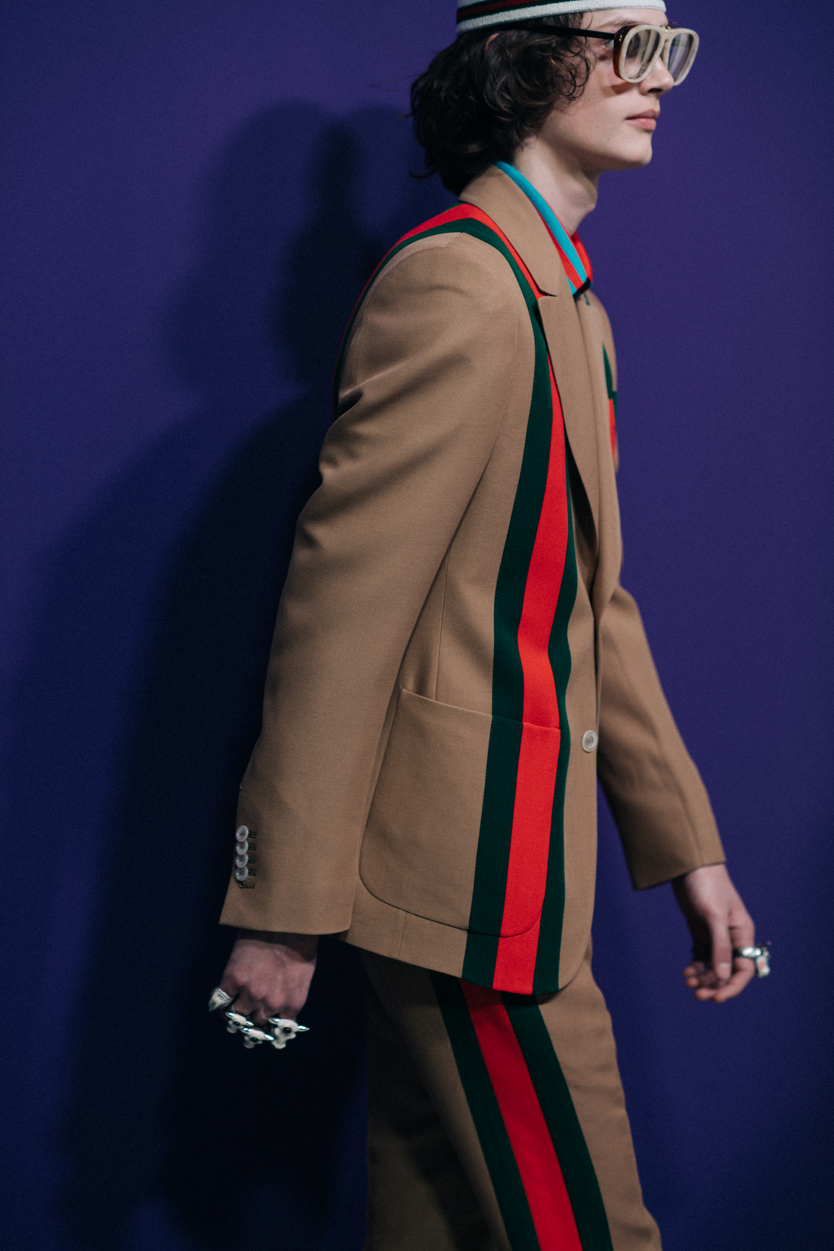 Ilja Van Vuuren wearing brown suit