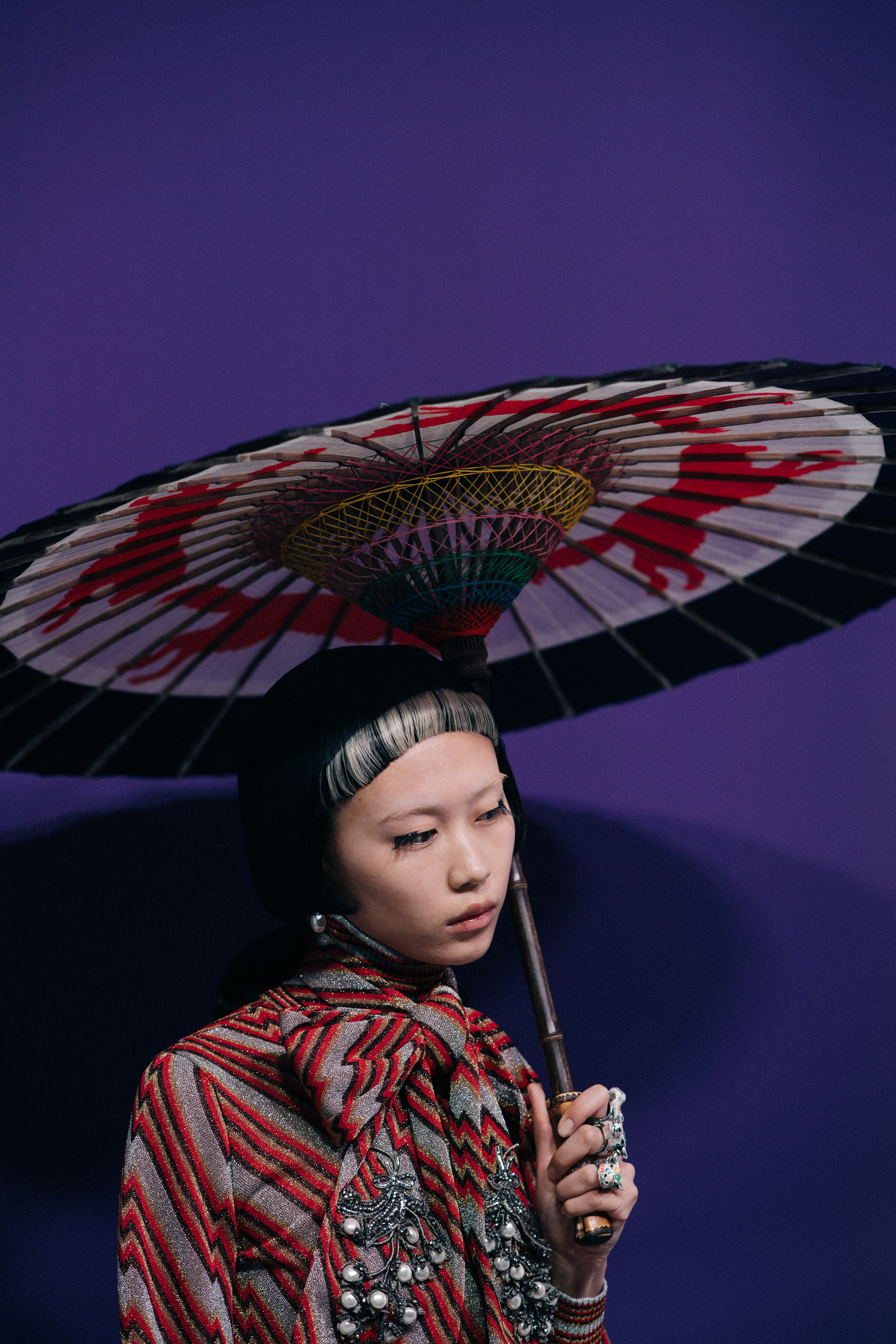 Ruoyang He with umbrella