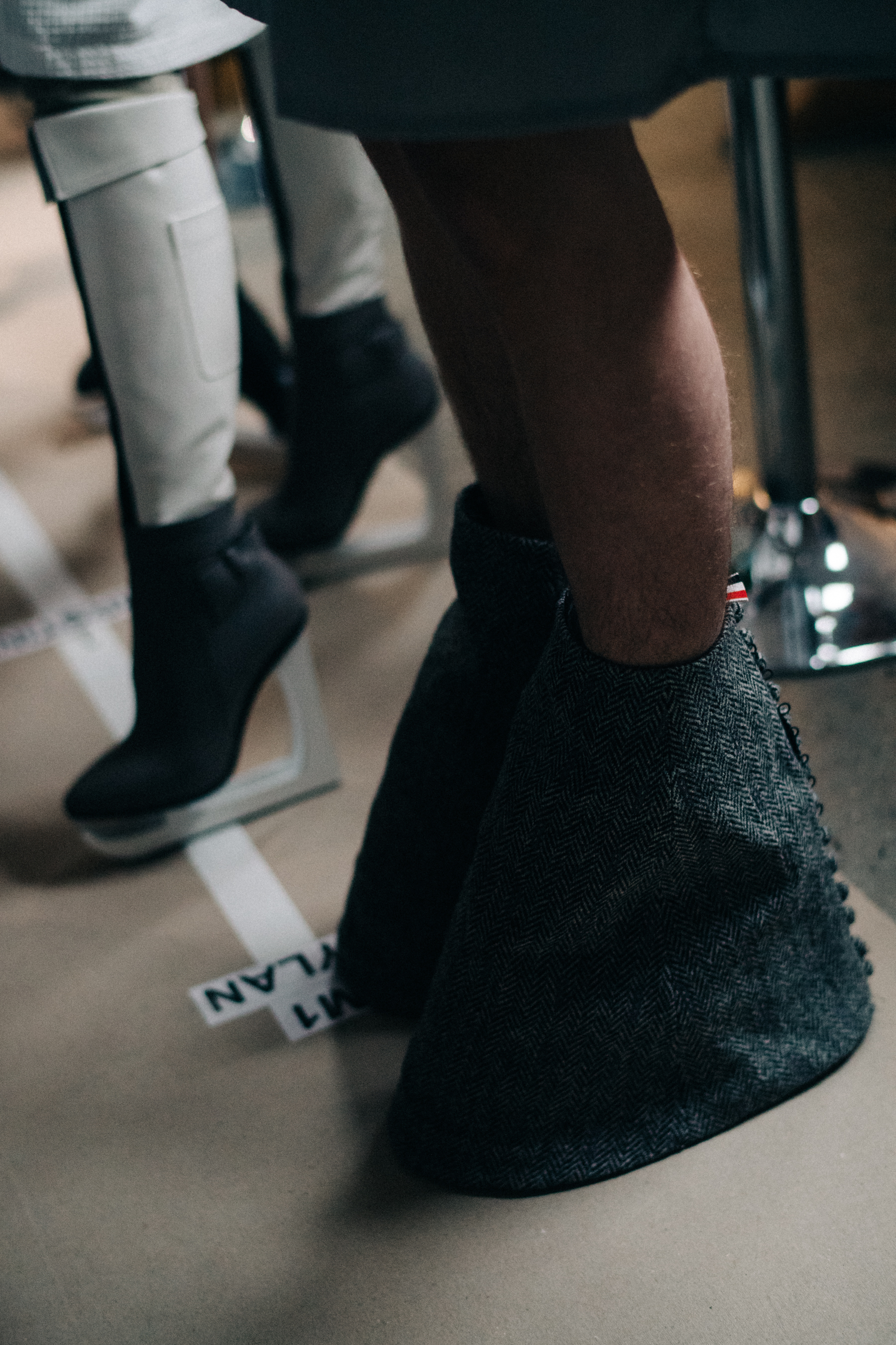 Model wearing cuff shoes accessory