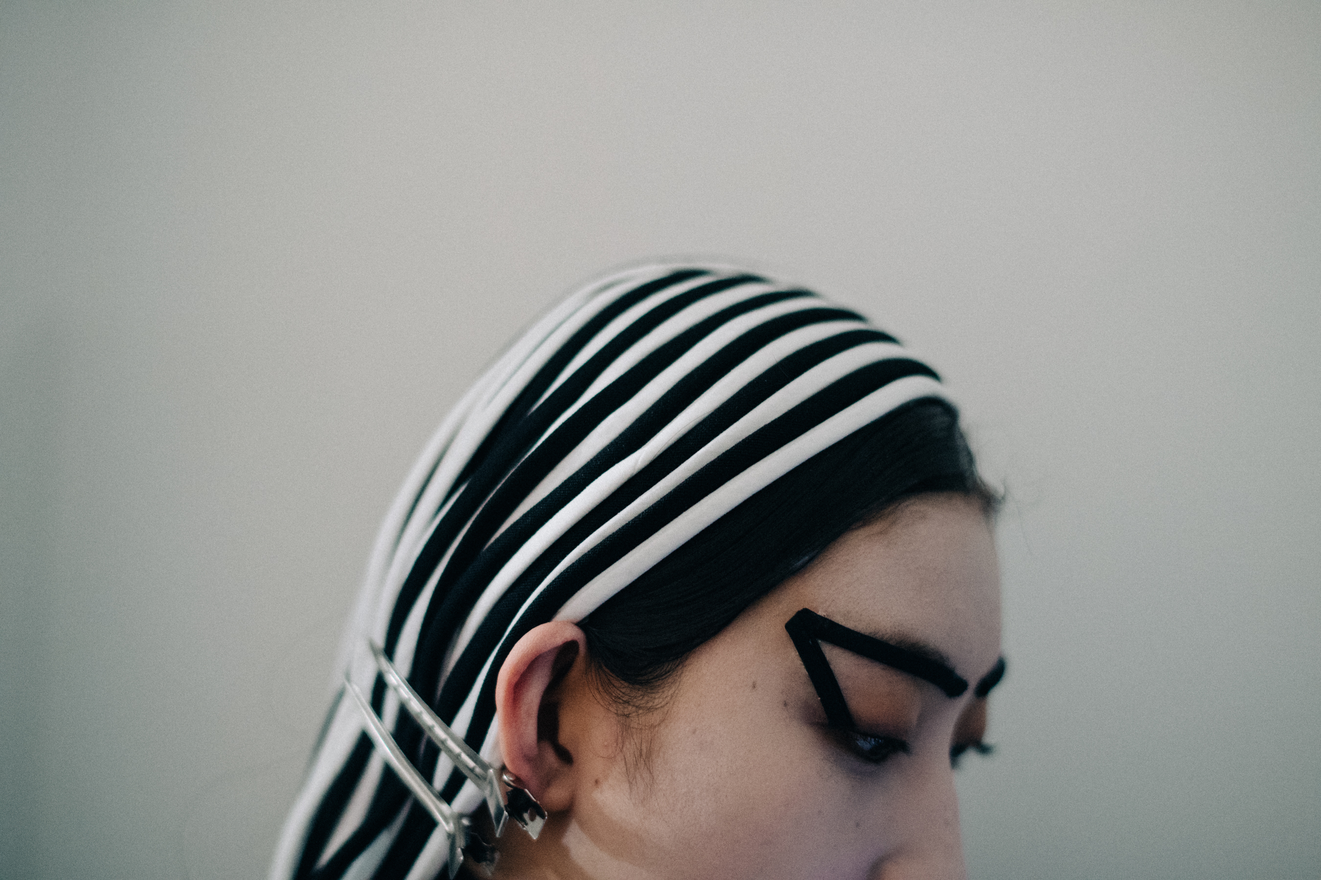 Model wearing head accessory
