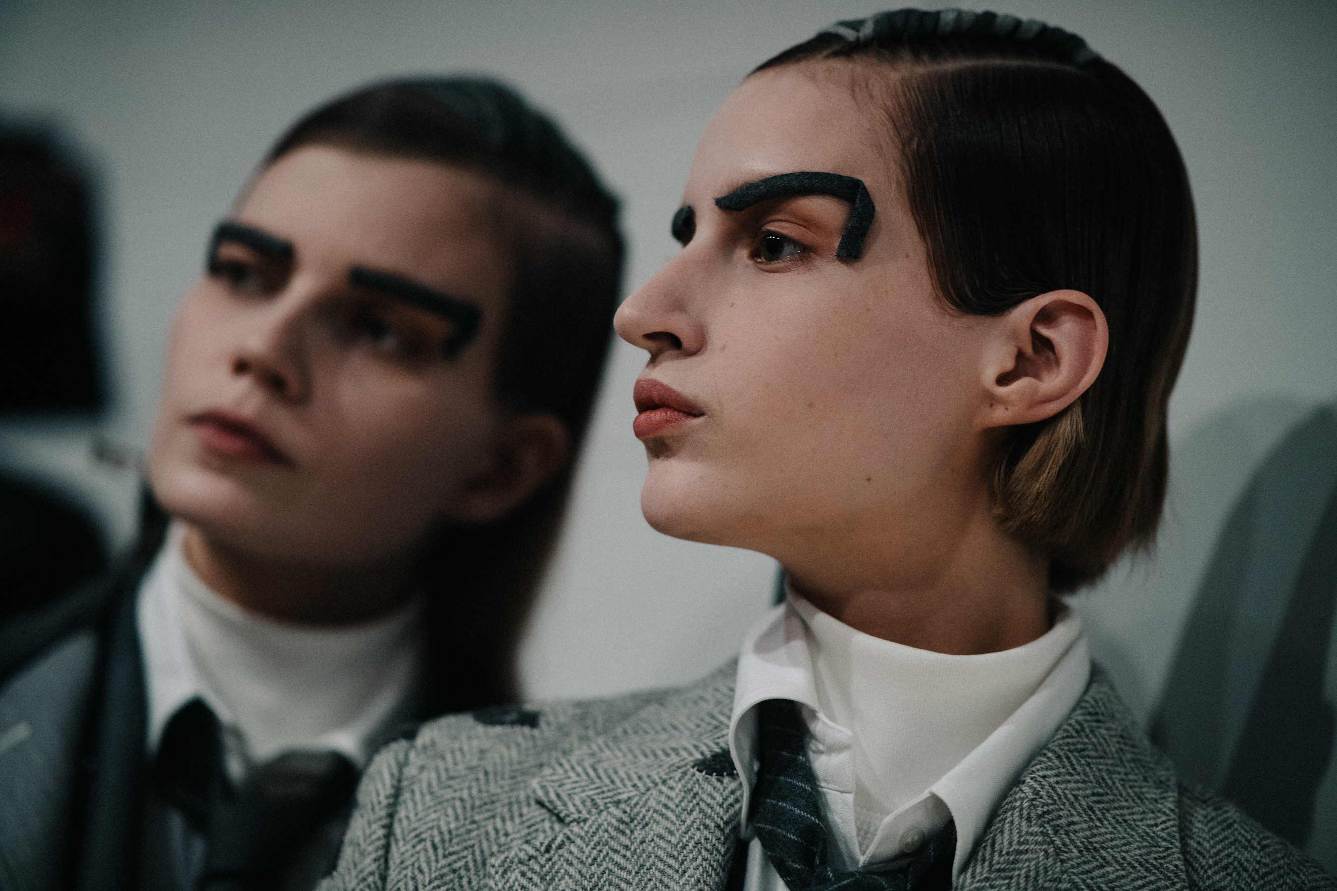 Luca Adamik wearing grey jacket