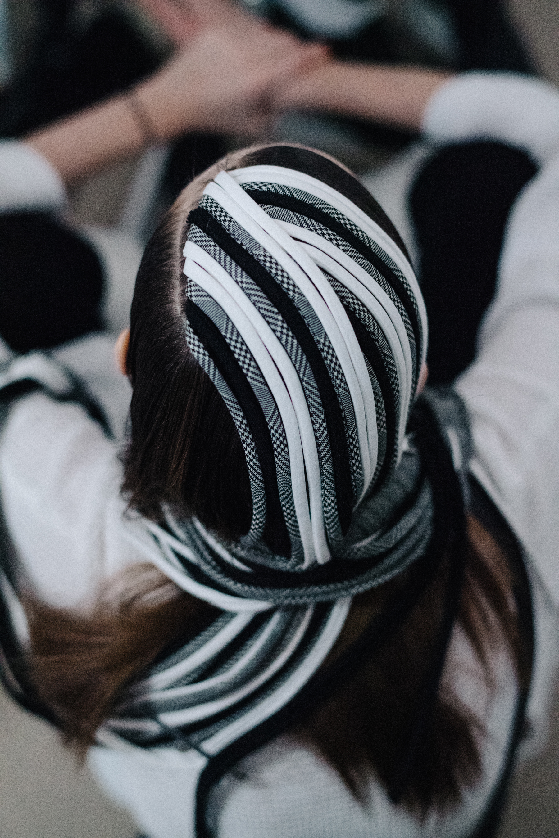 Model wearing head accessory