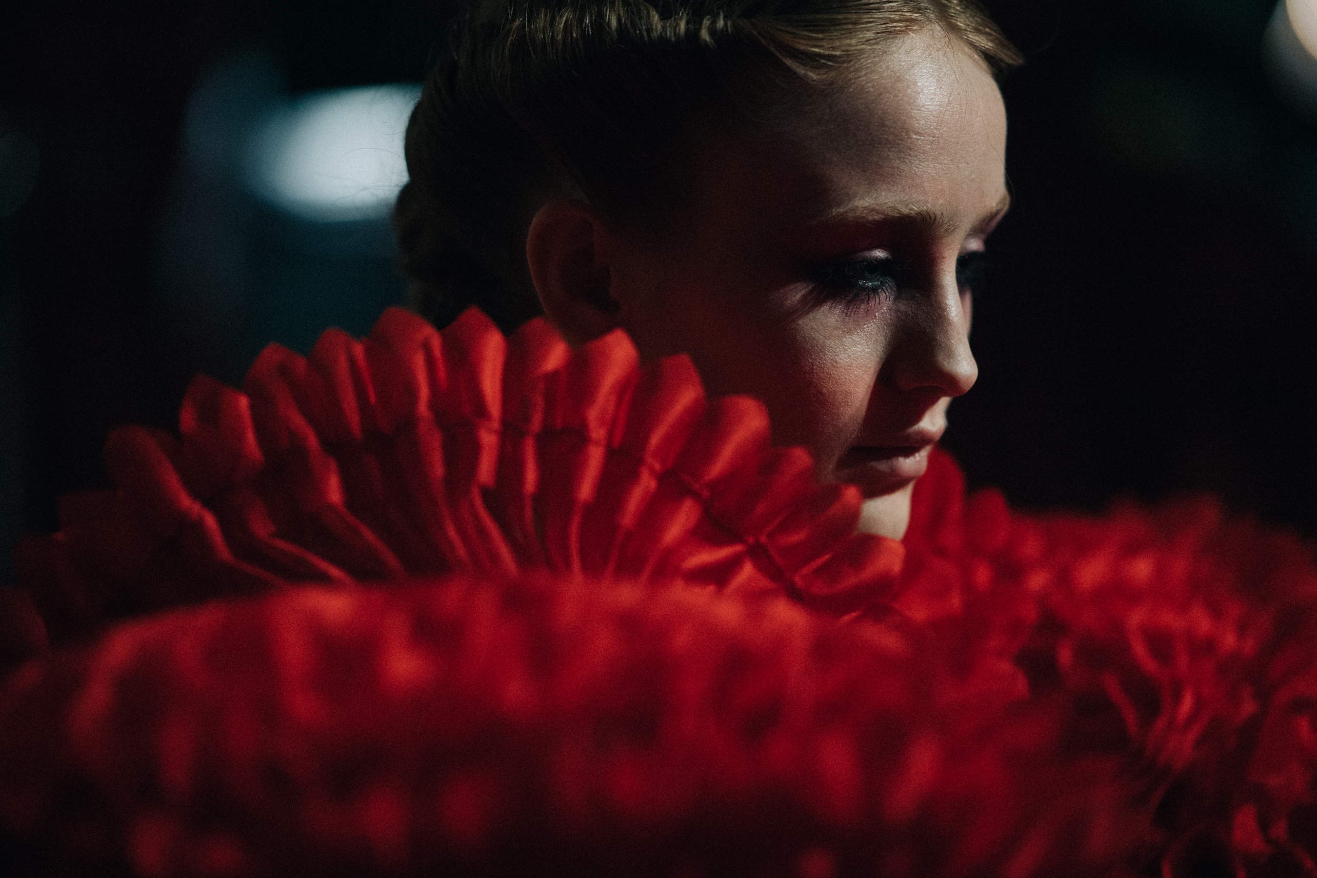 Model India Salvor Menuez wearing red