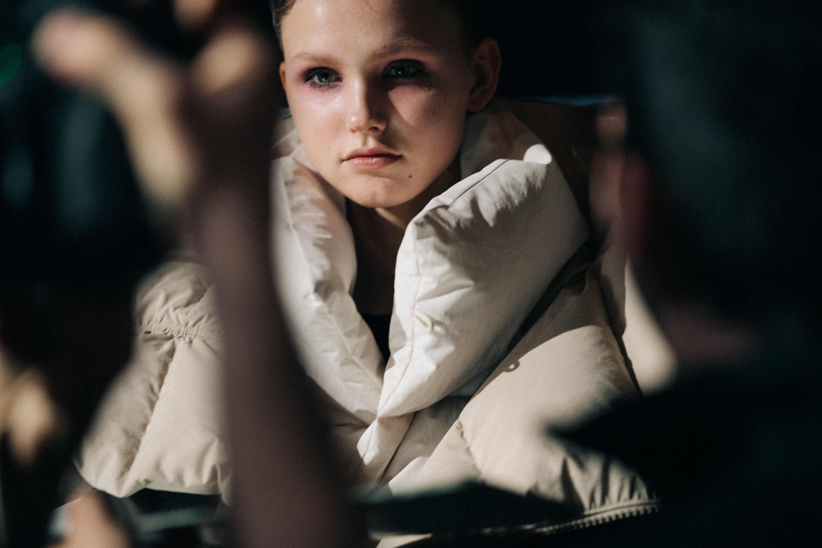 Model wearing white puffer jacket