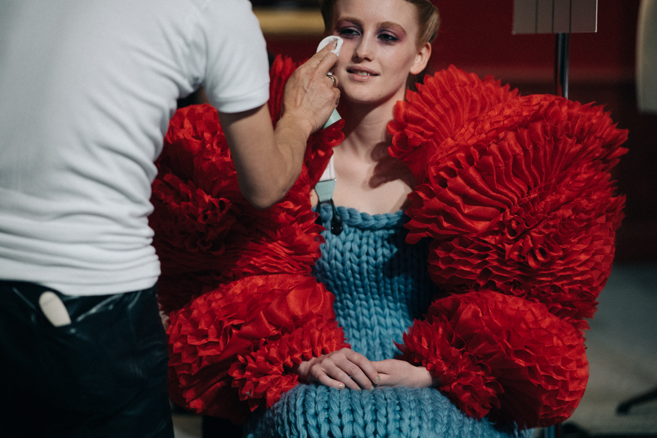 India Salvor Menuez wearing red