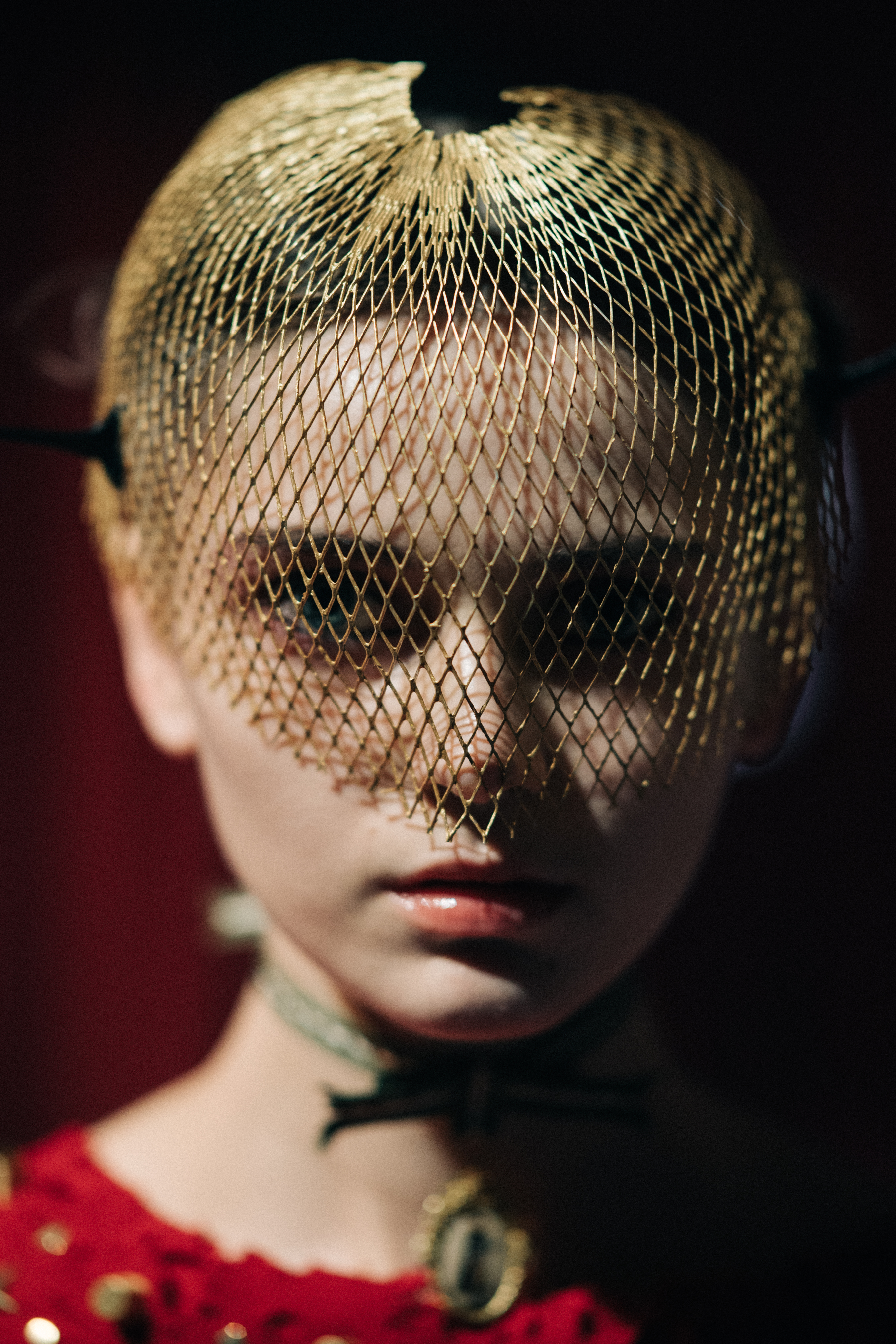 Portrait of a model wearing fencing mask