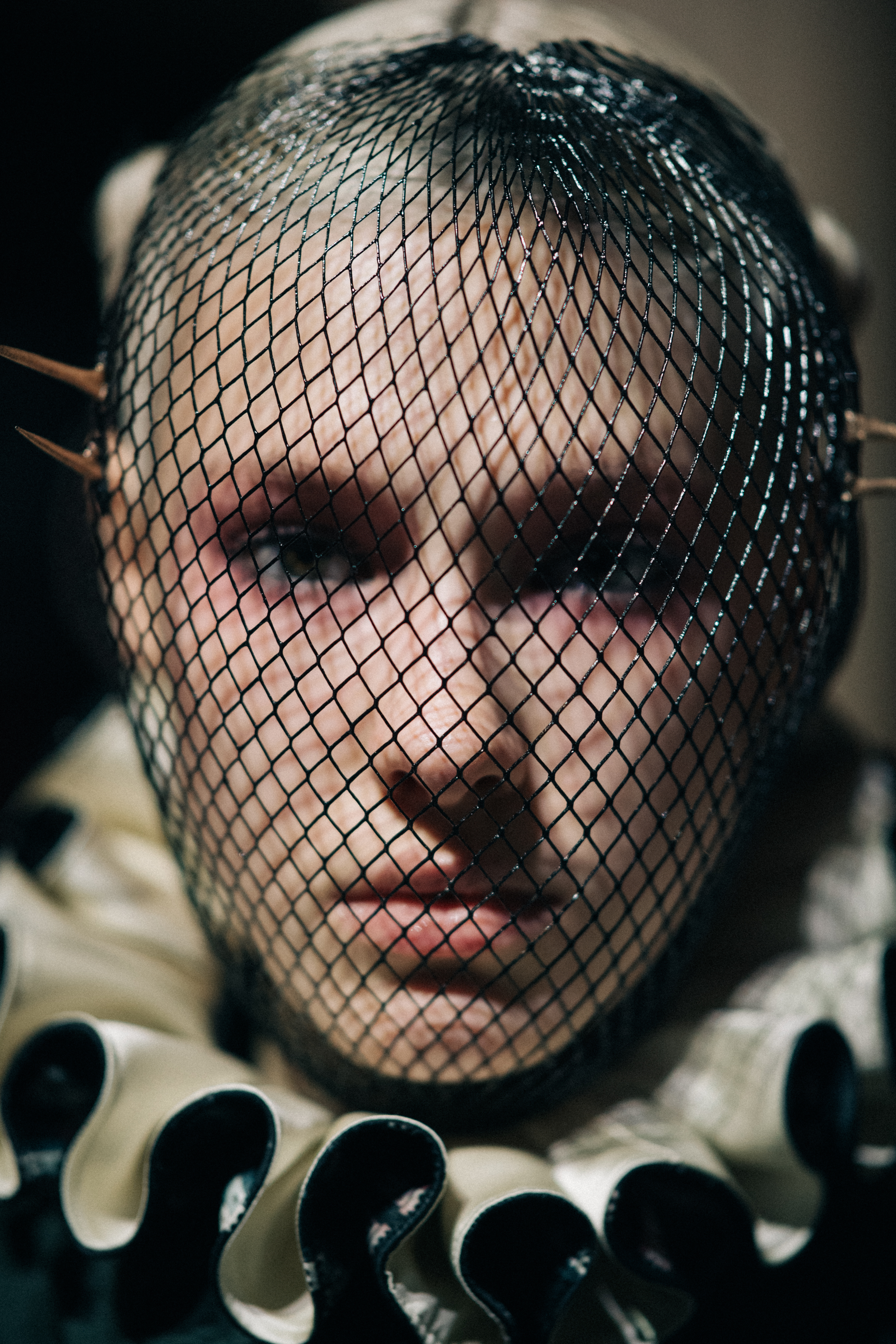 Regan Garrett wearing fencing mask