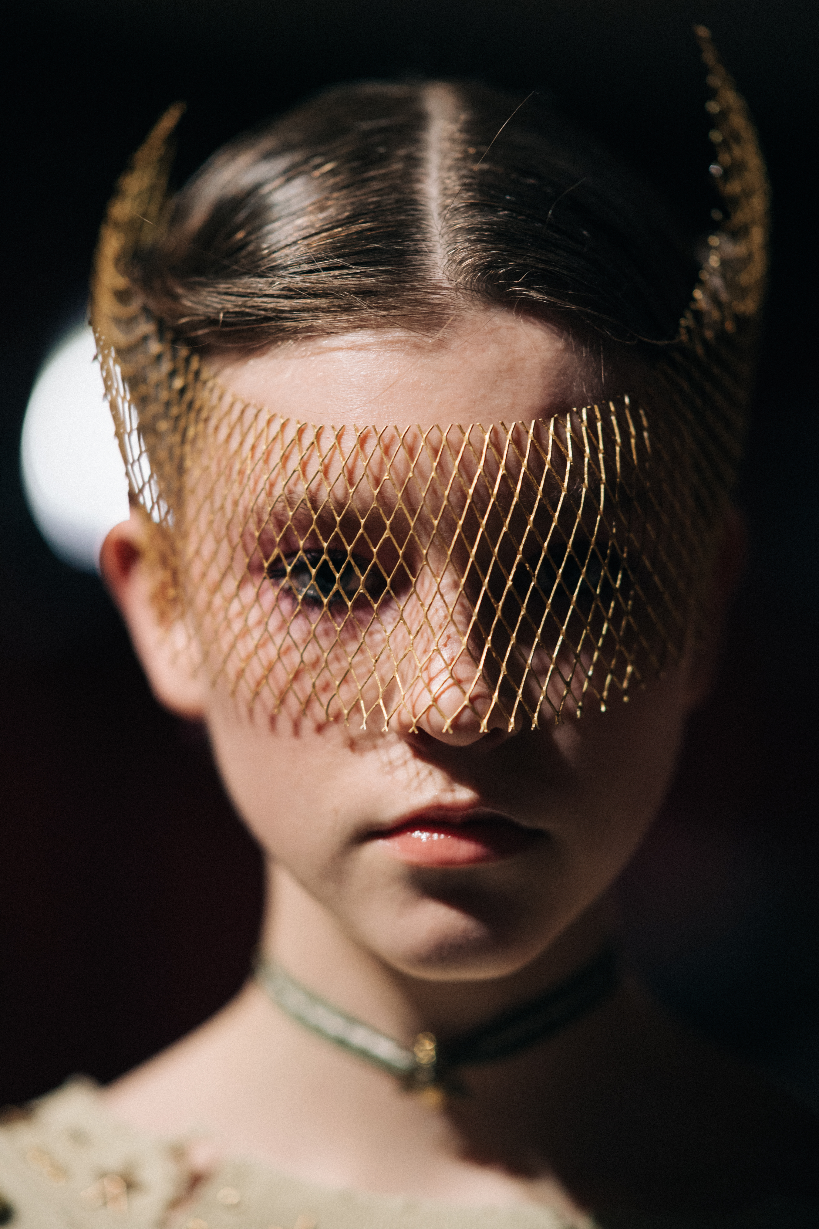 Carson Zehner wearing fencing mask