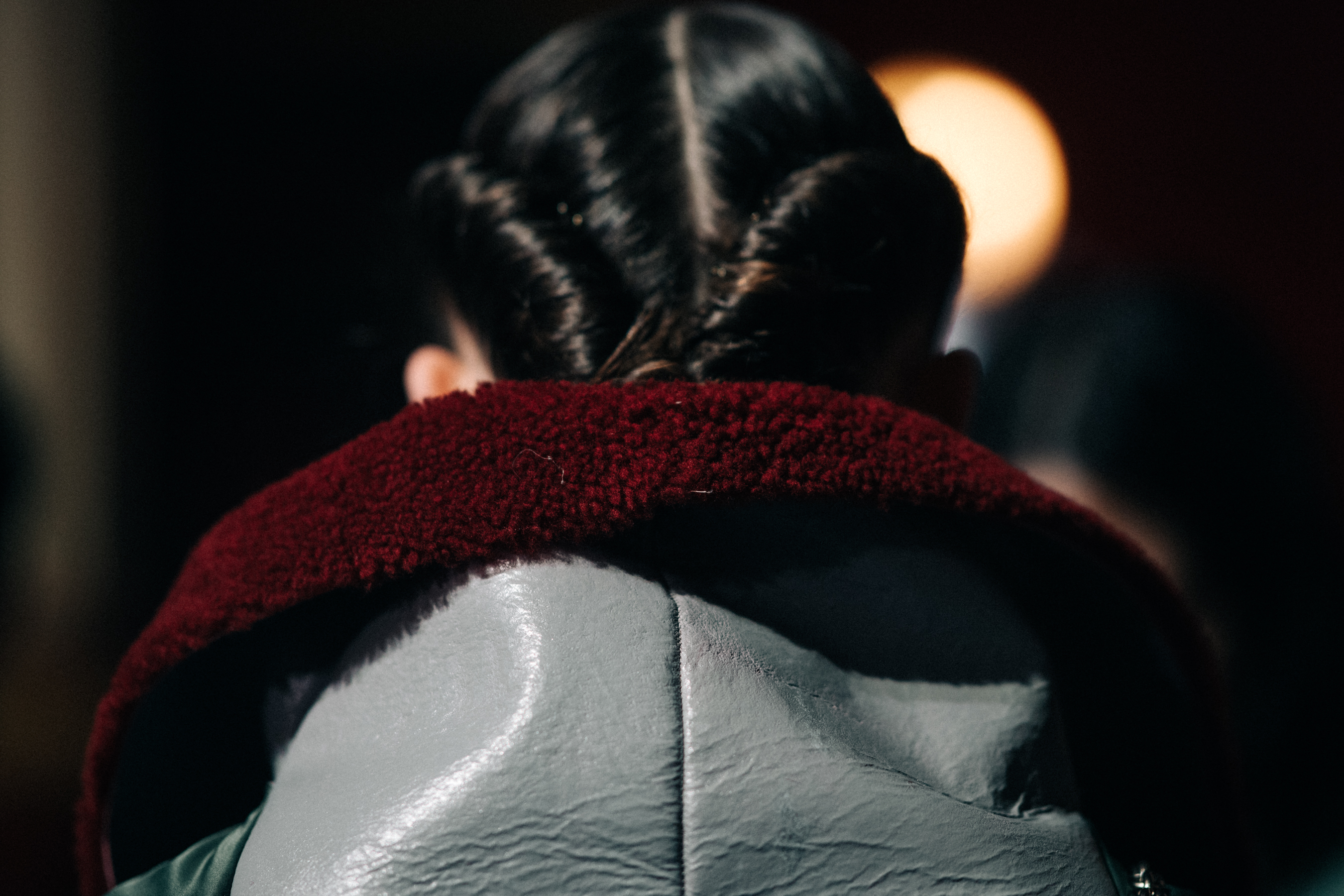 Model wearing red hood