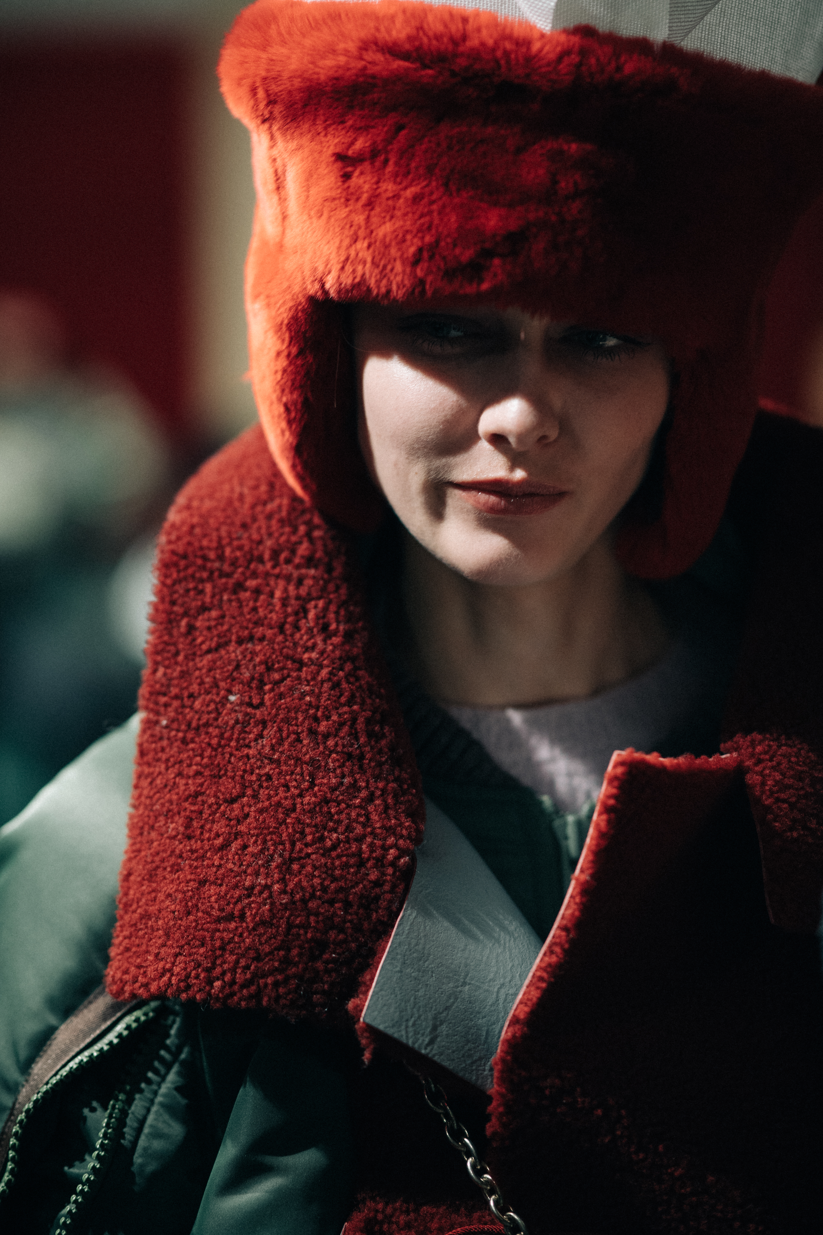 Marine Francois wearing red hat