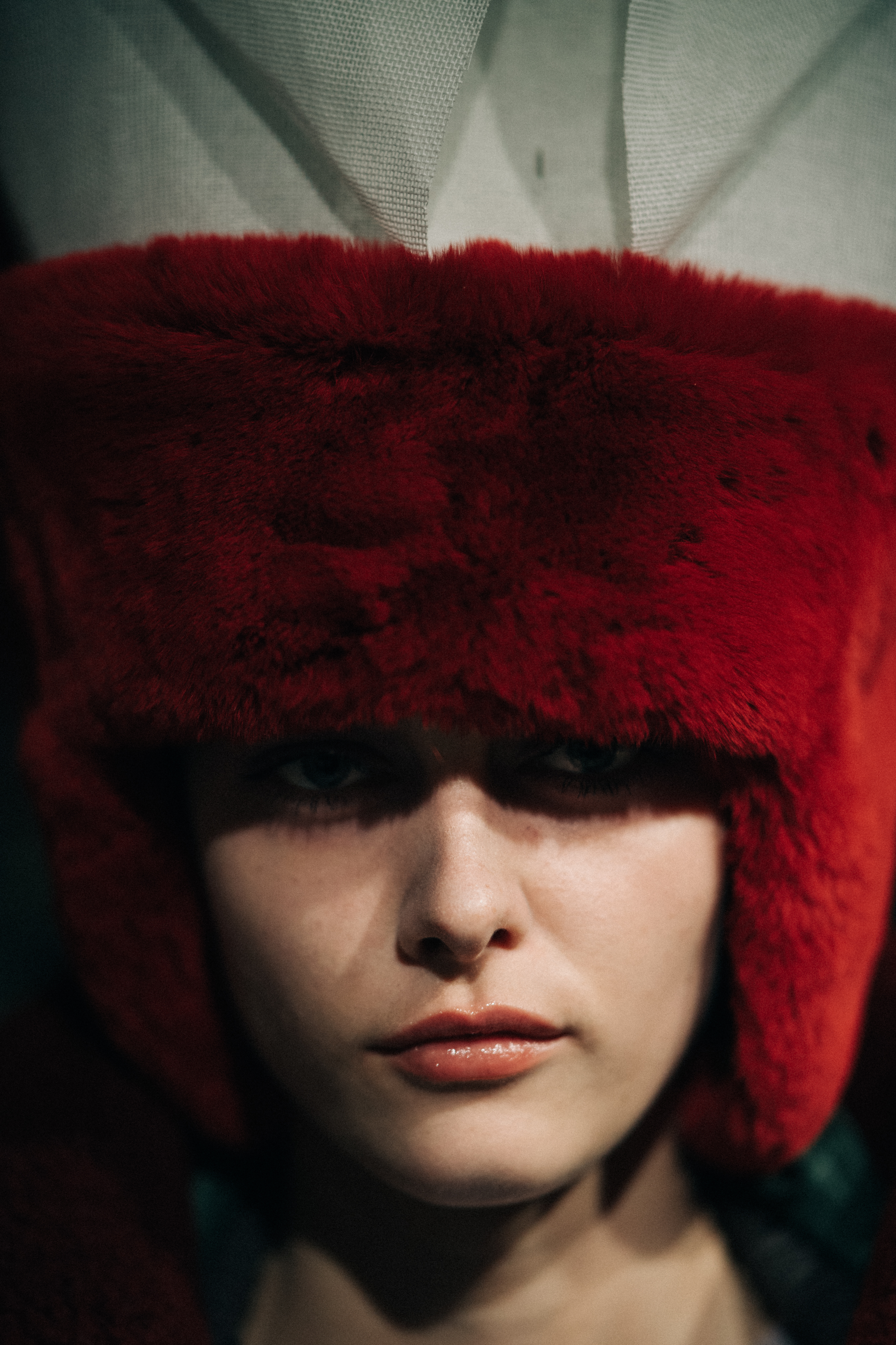 Marine Francois wearing red hat