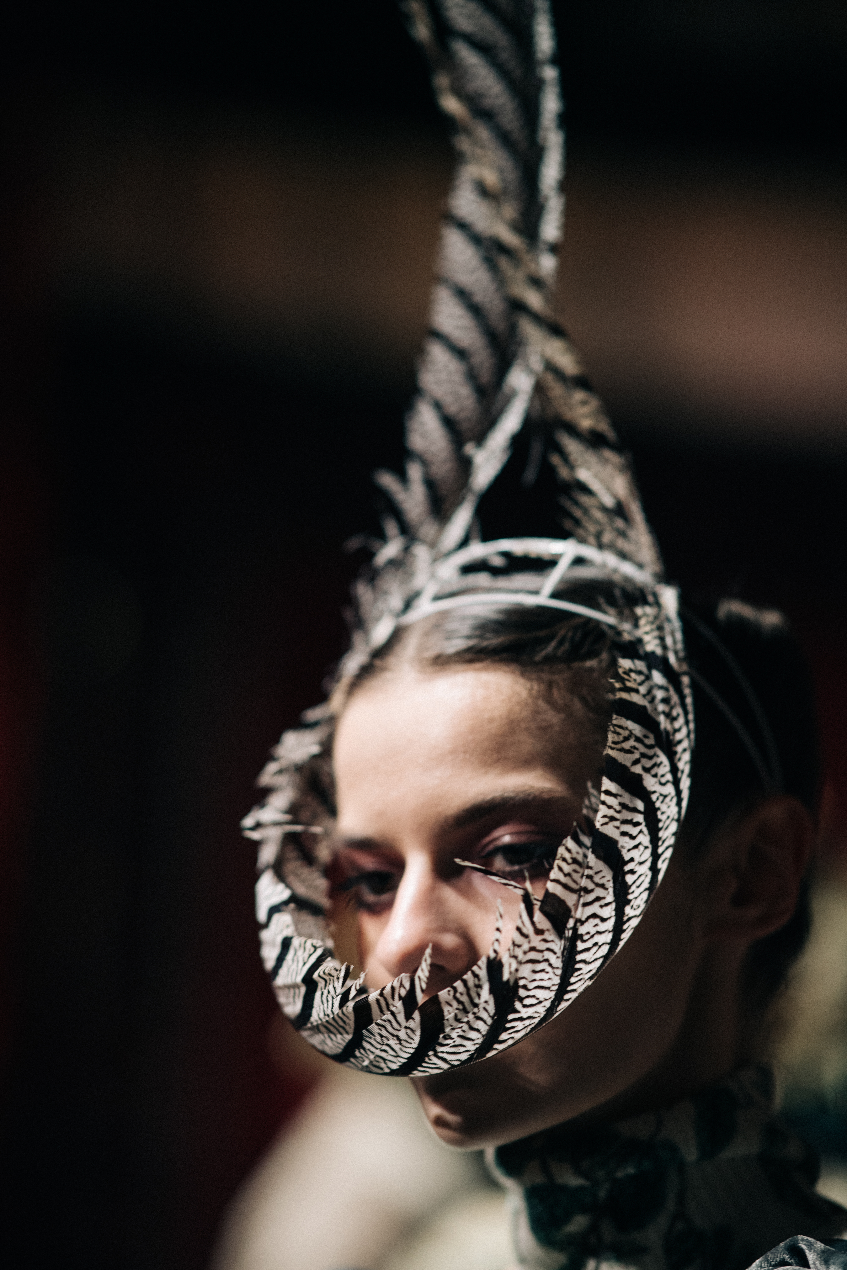 Dasha Denisenko wearing feather mask