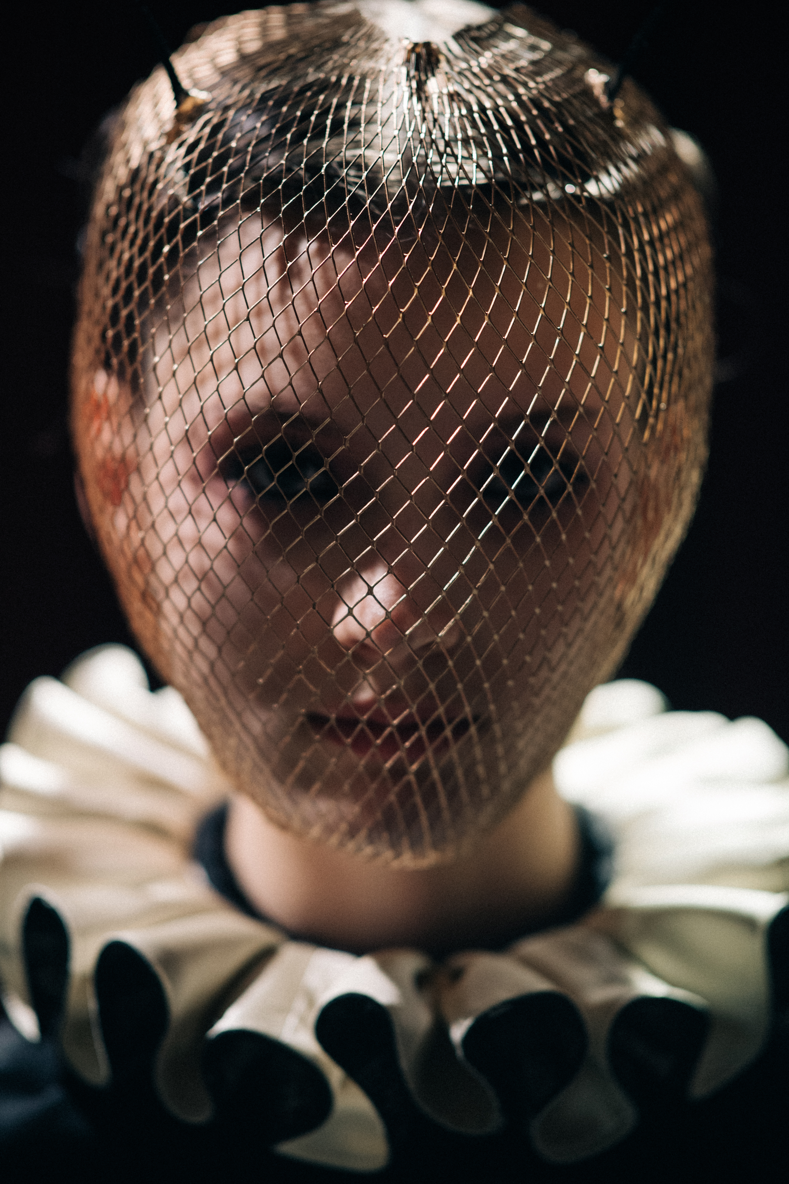 Portrait of a model with fencing mask
