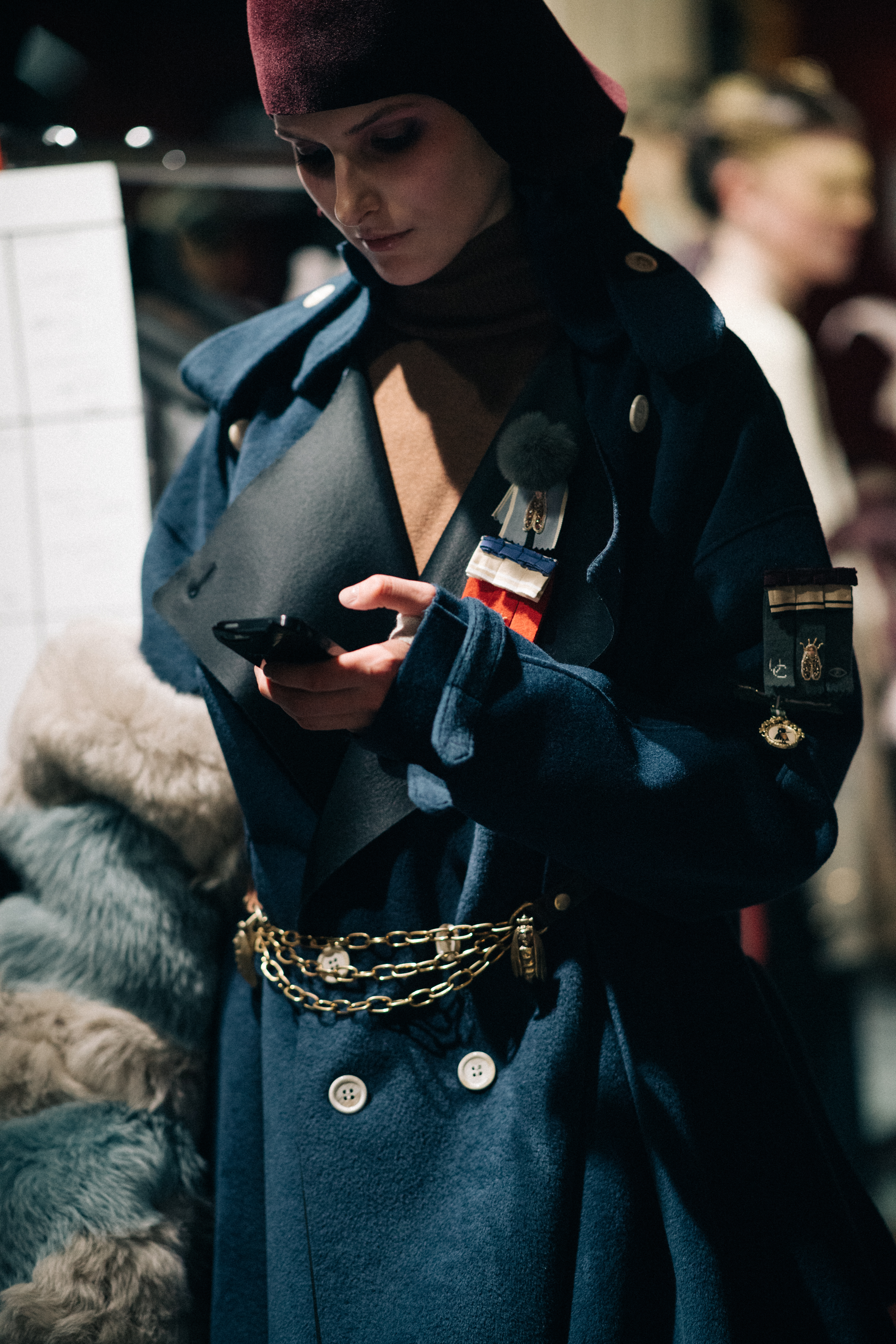 Model wearing blue jacket