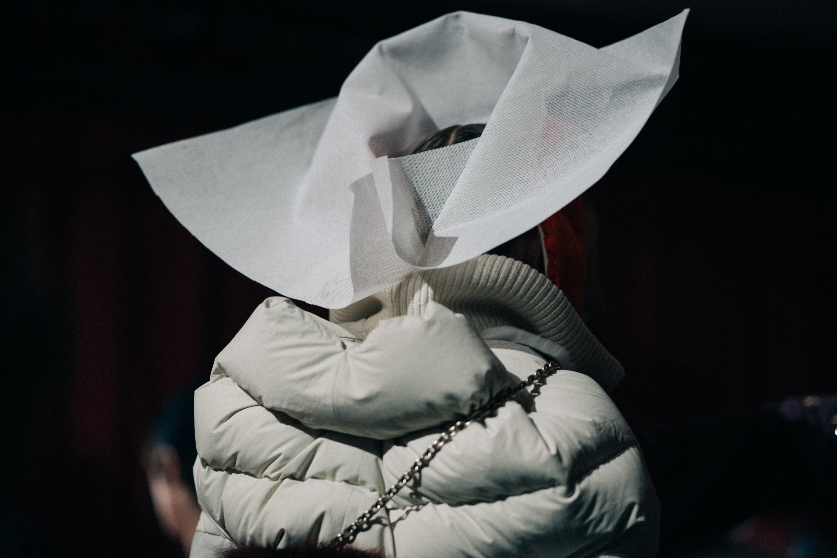 Model wearing white puffer jacket