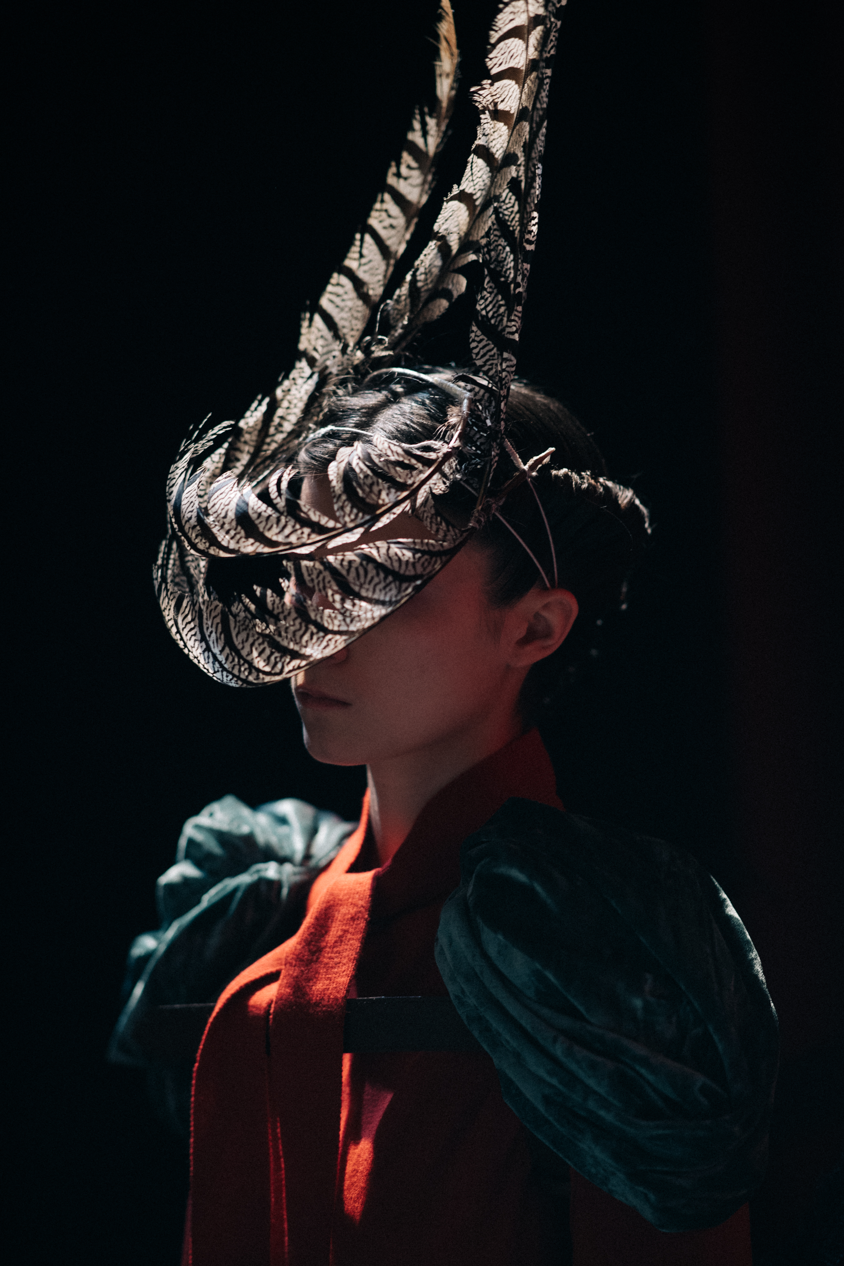Julia Joubert wearing feather mask