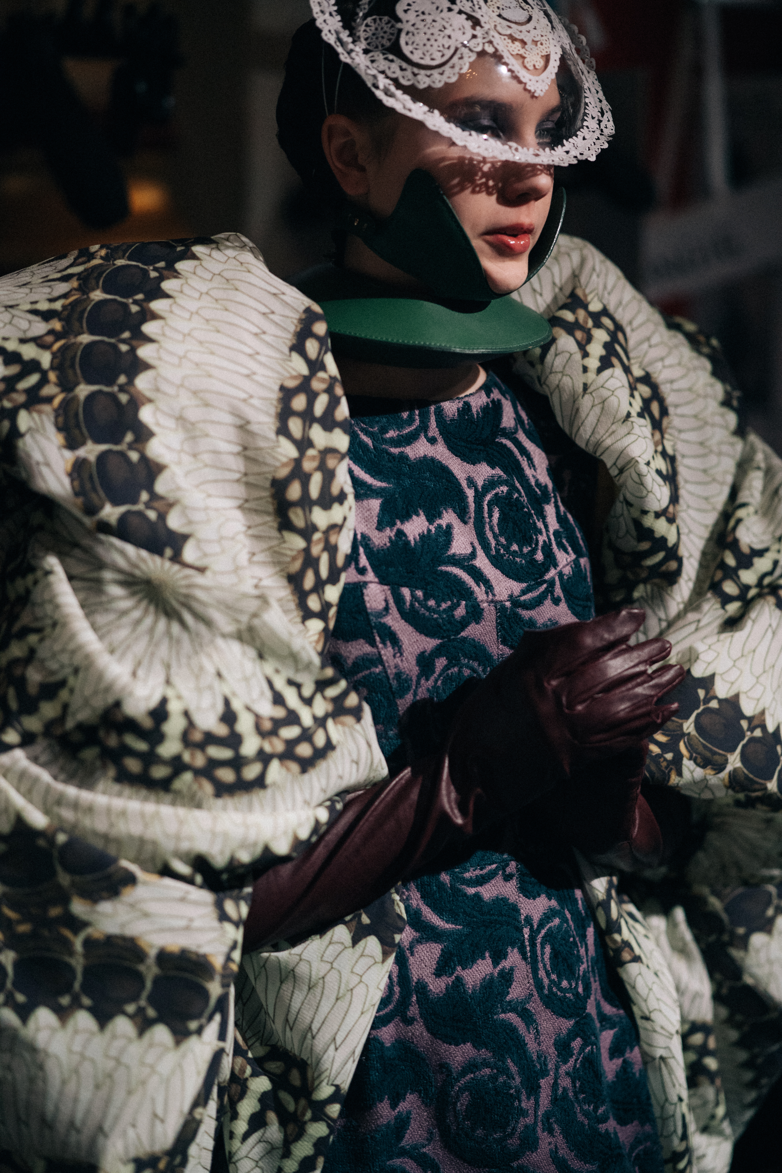 Model wearing theatrical clothes