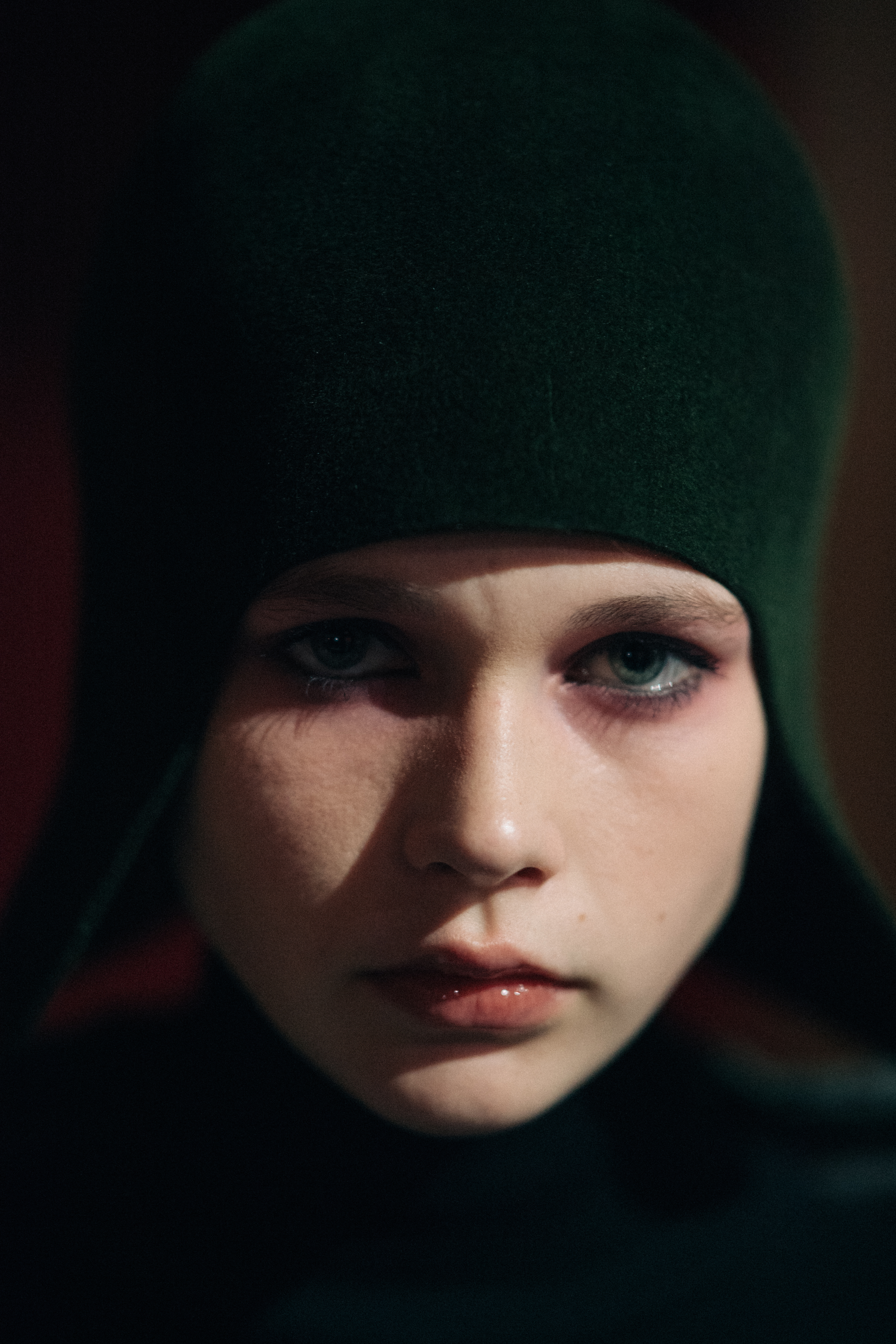 Portrait of a model wearing black hat