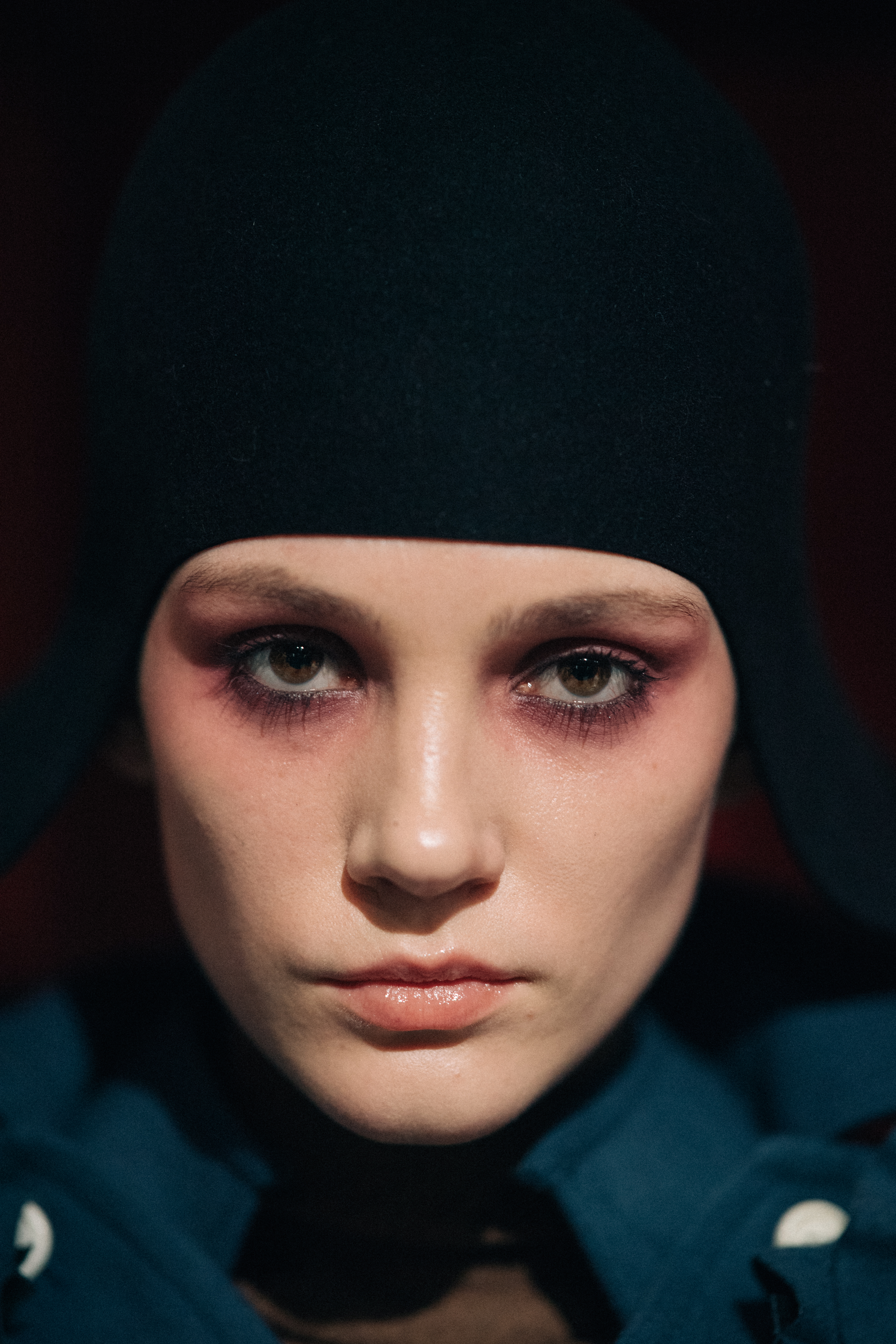 Portrait of a model wearing black hat