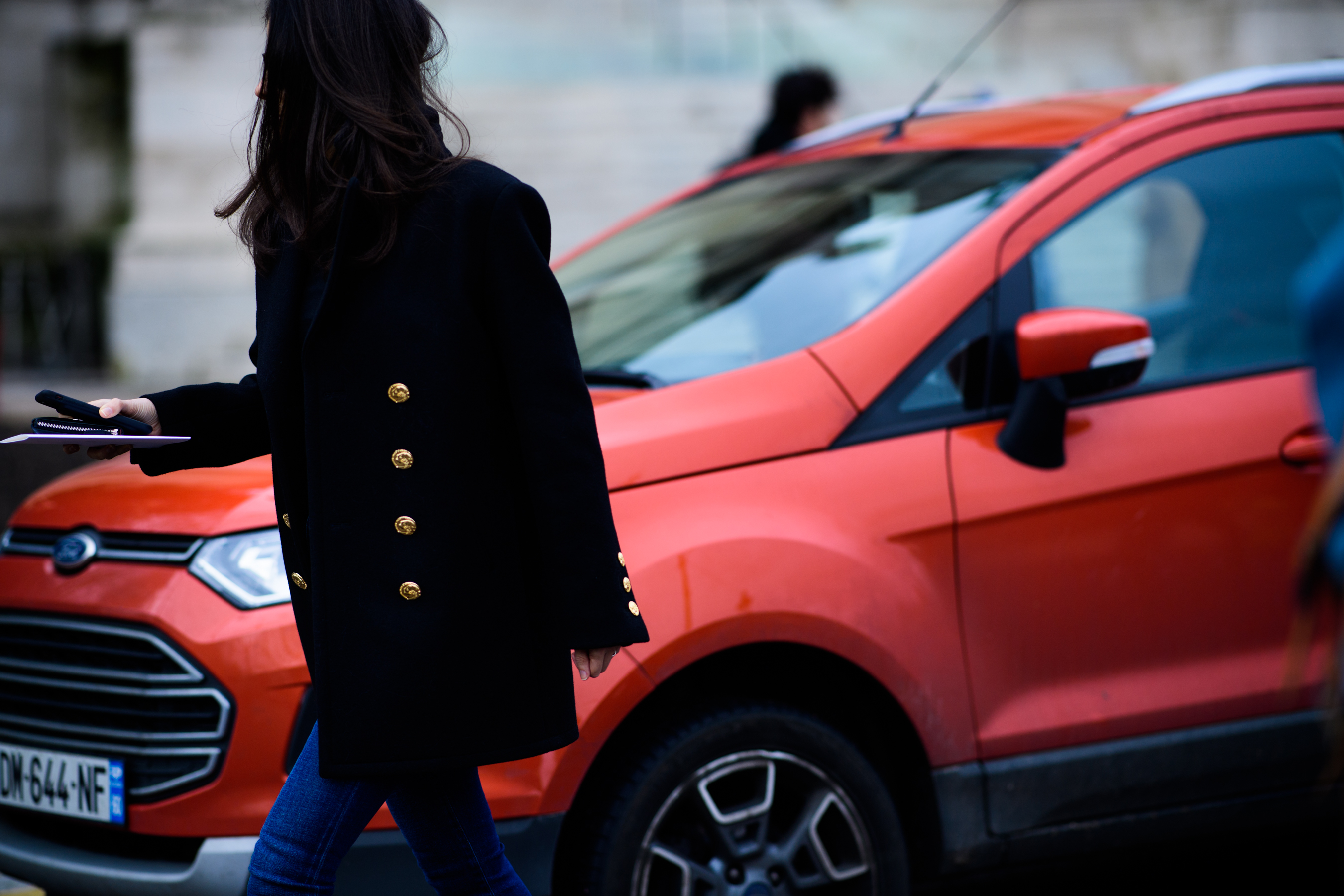 Woman wearing military style jacket