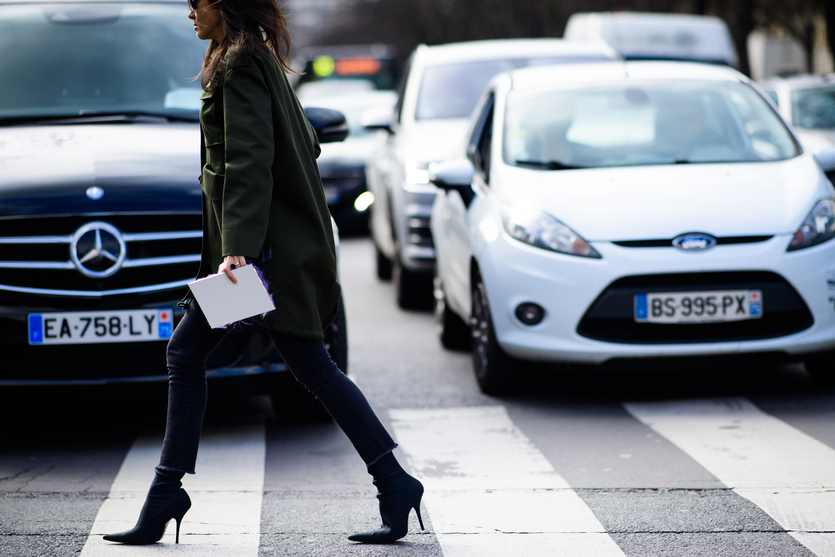 Woman wearing black stilettos