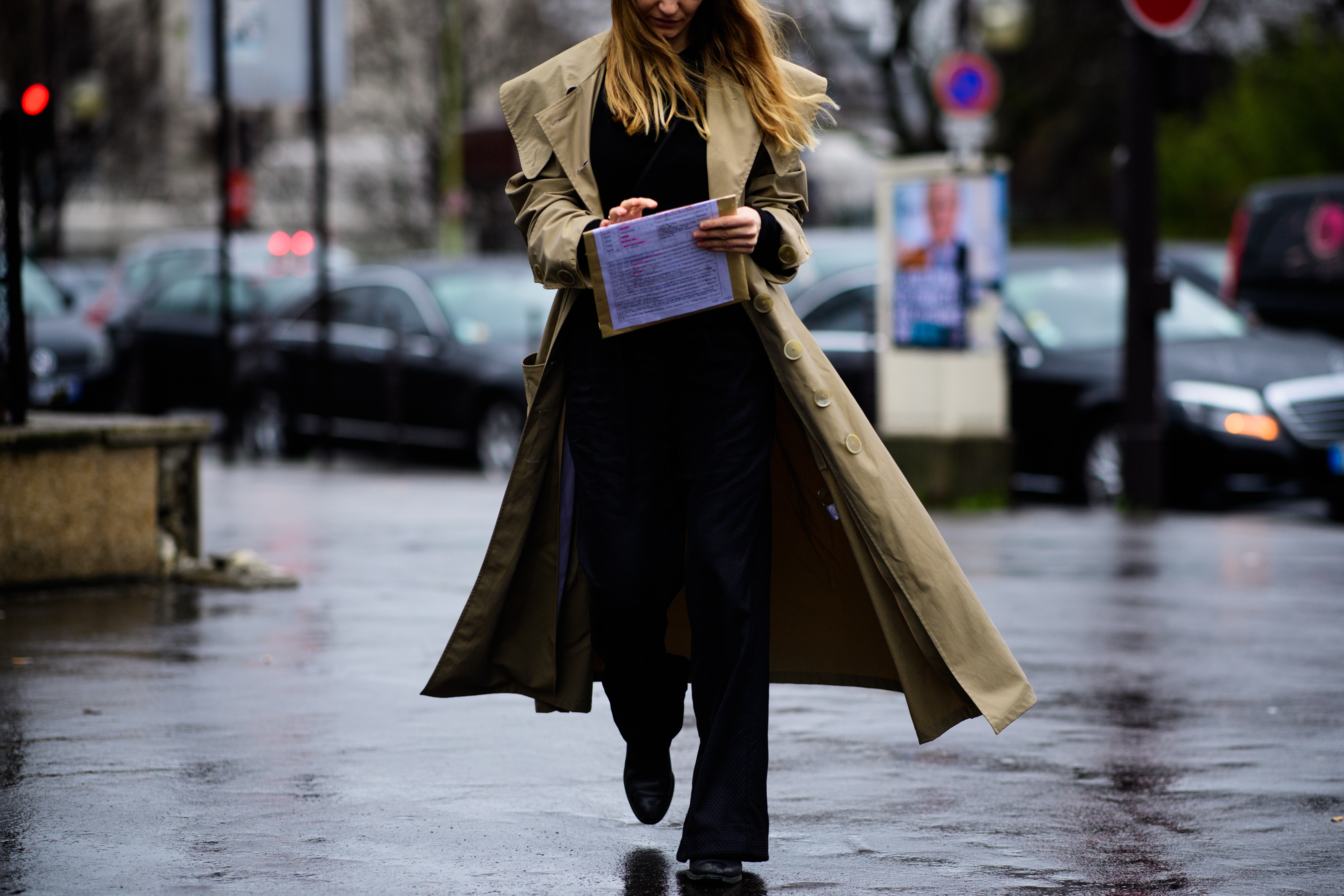Woman wearing long beige coat