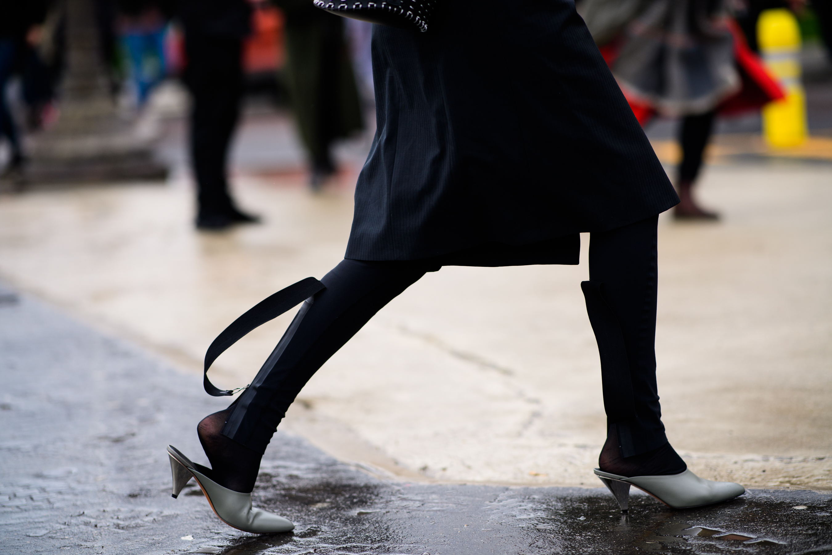 Woman wearing white shoes
