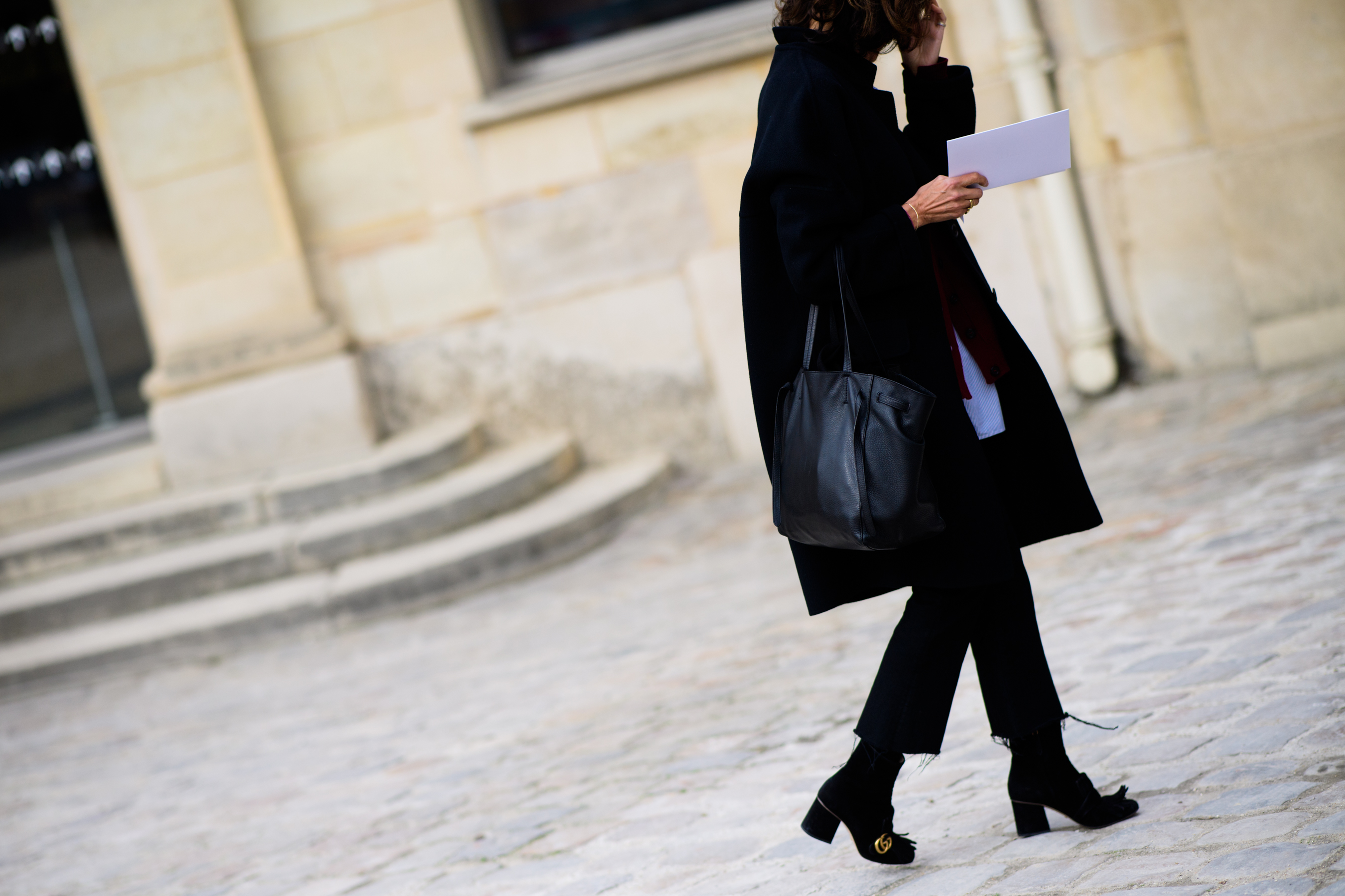 Woman wearing Gucci shoes