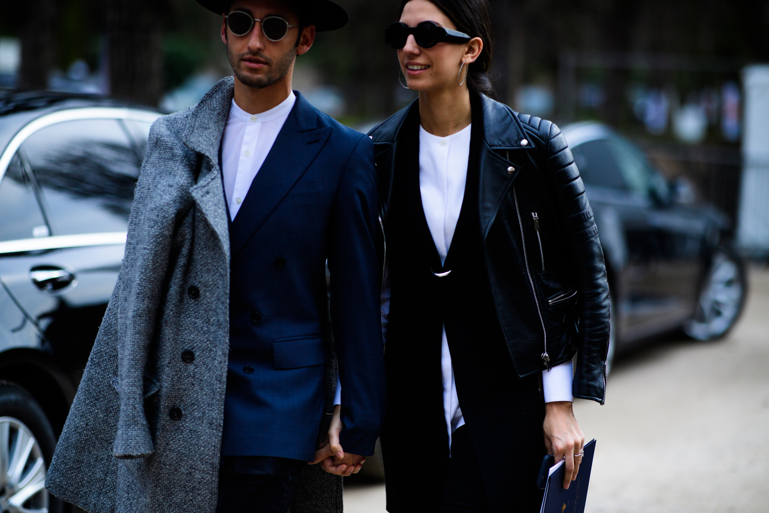 Man and woman wearing blazer and leather