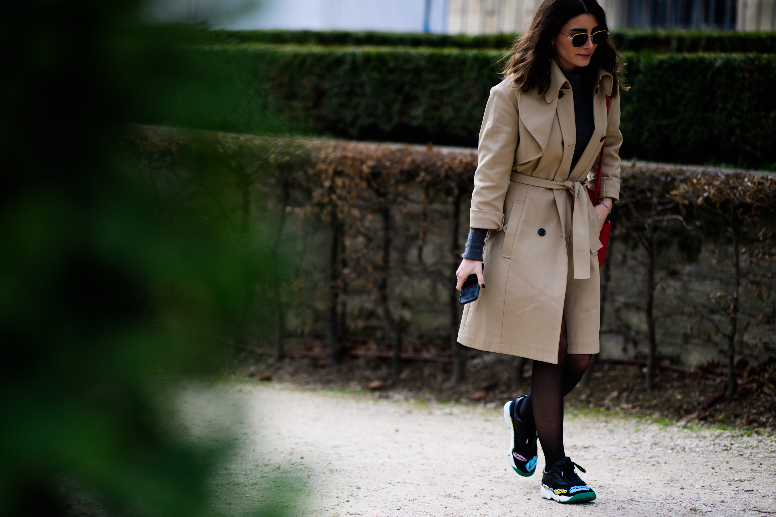 Woman wearing Dior couture sneakers
