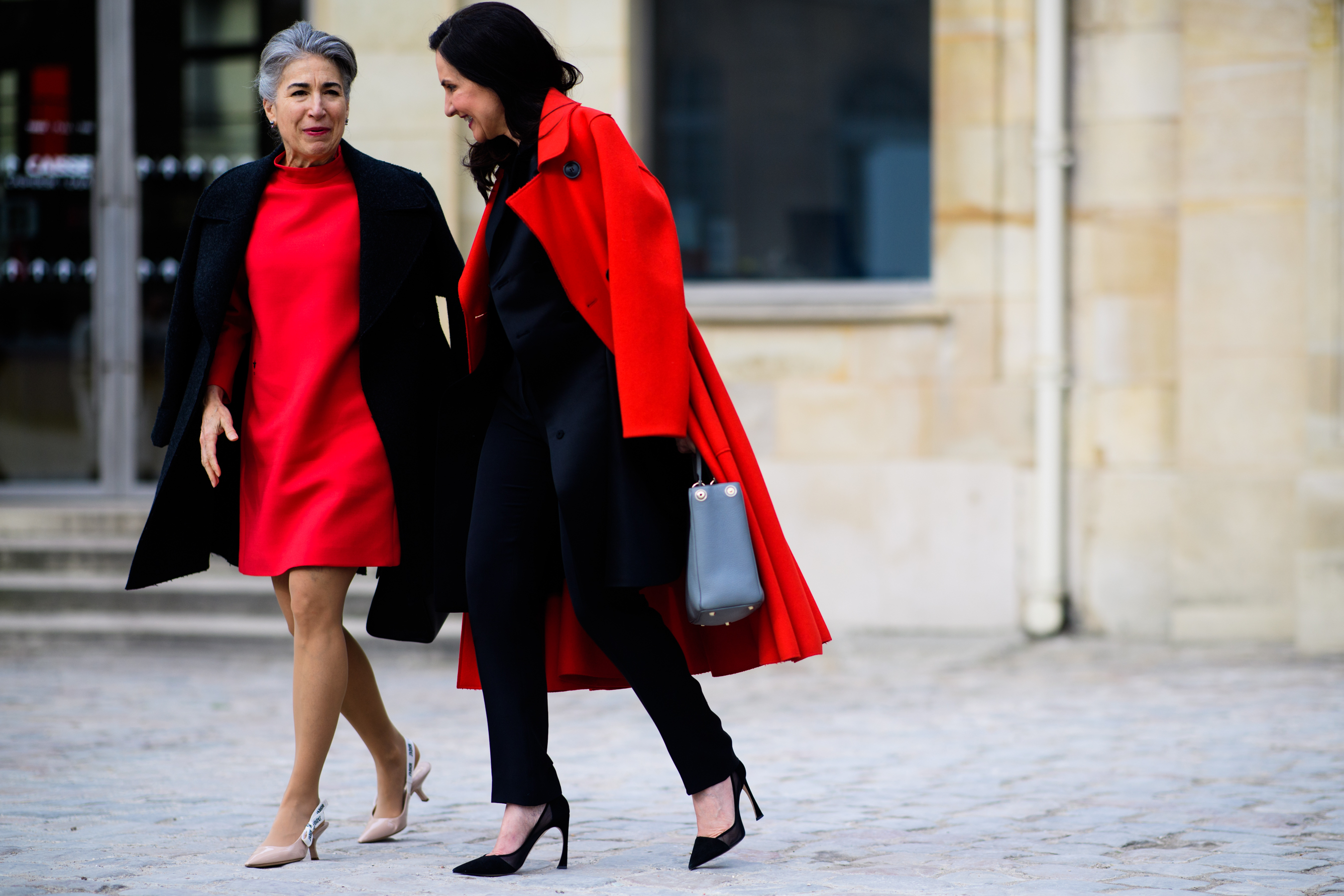Two women wearing Dior total looks