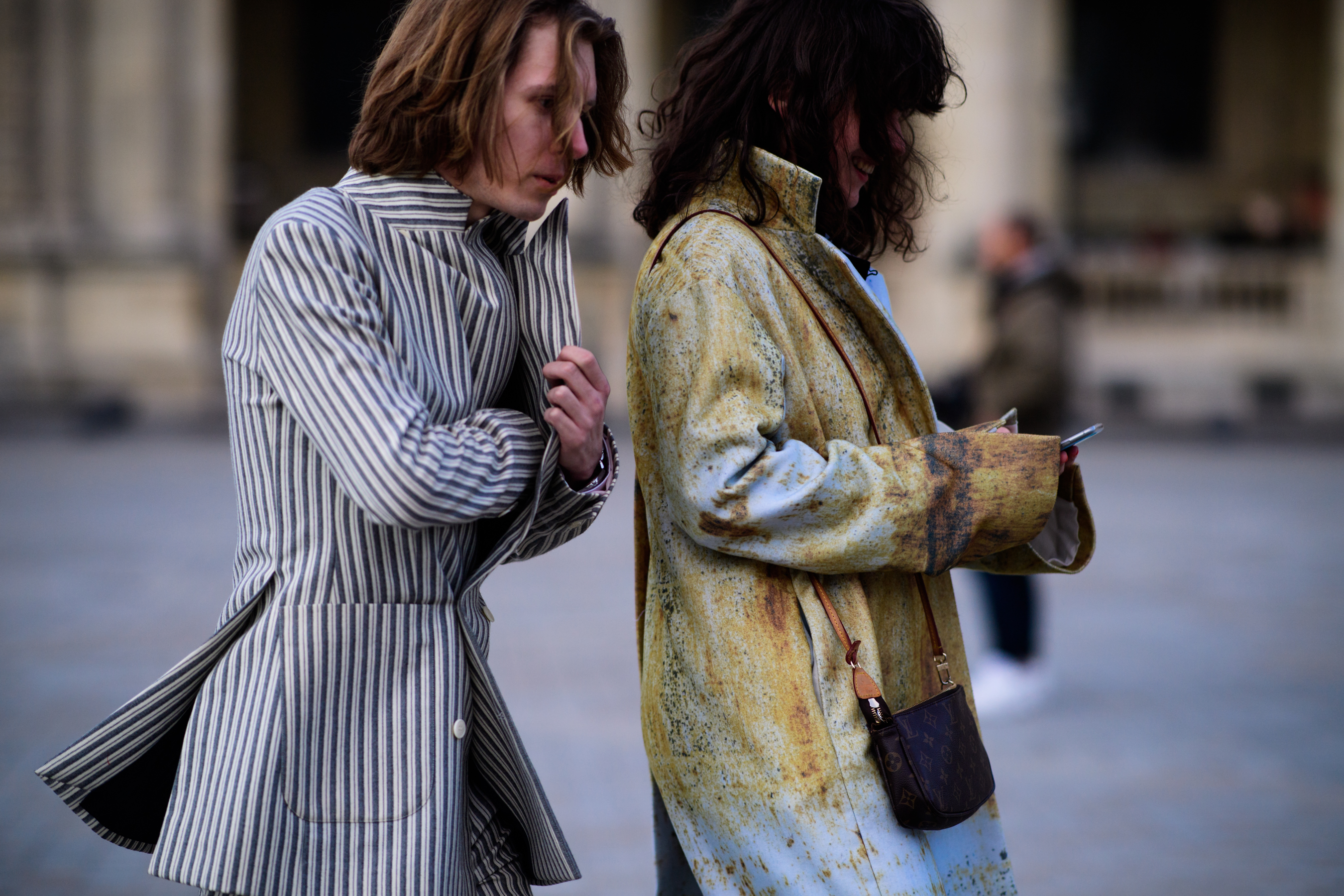 Man and woman wearing coats