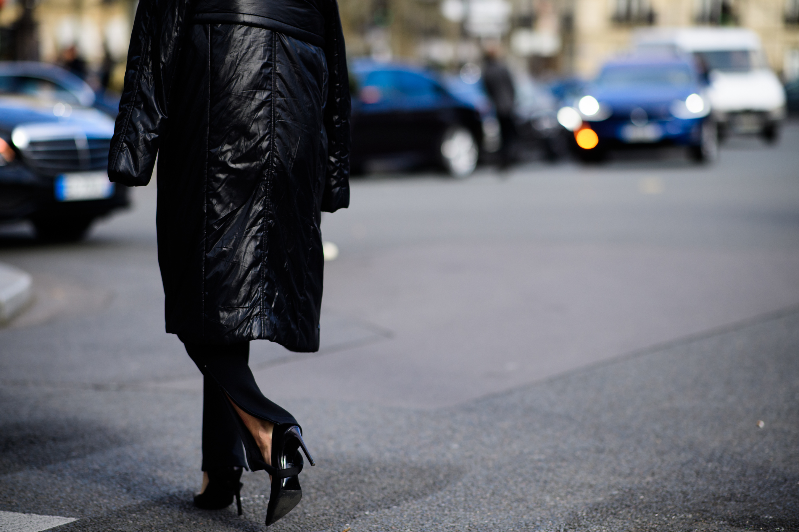 Woman wearing black stiletto shoes