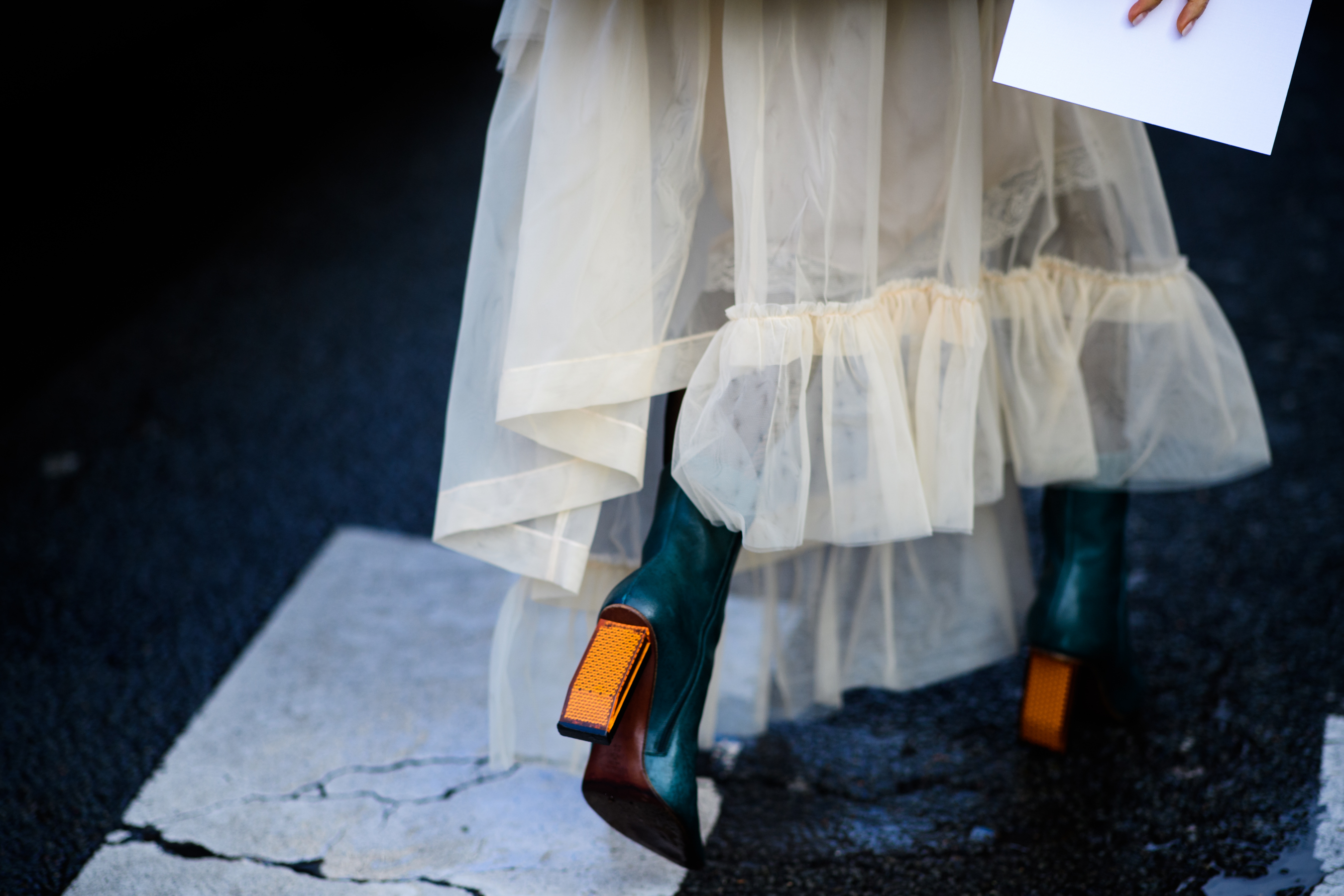 Woman wearing tutu and Vetements boots
