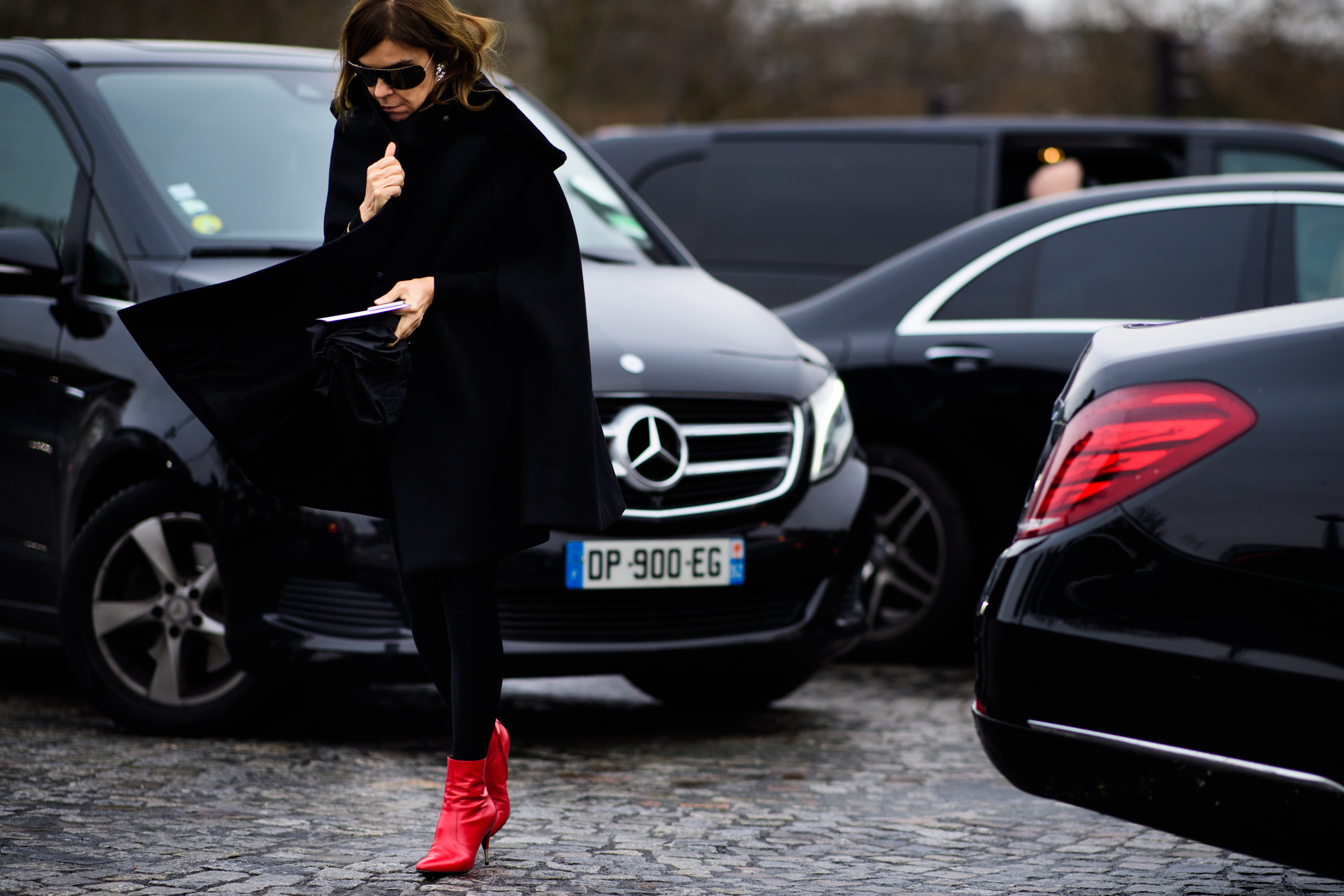 French VOGUE editor wearing red boots