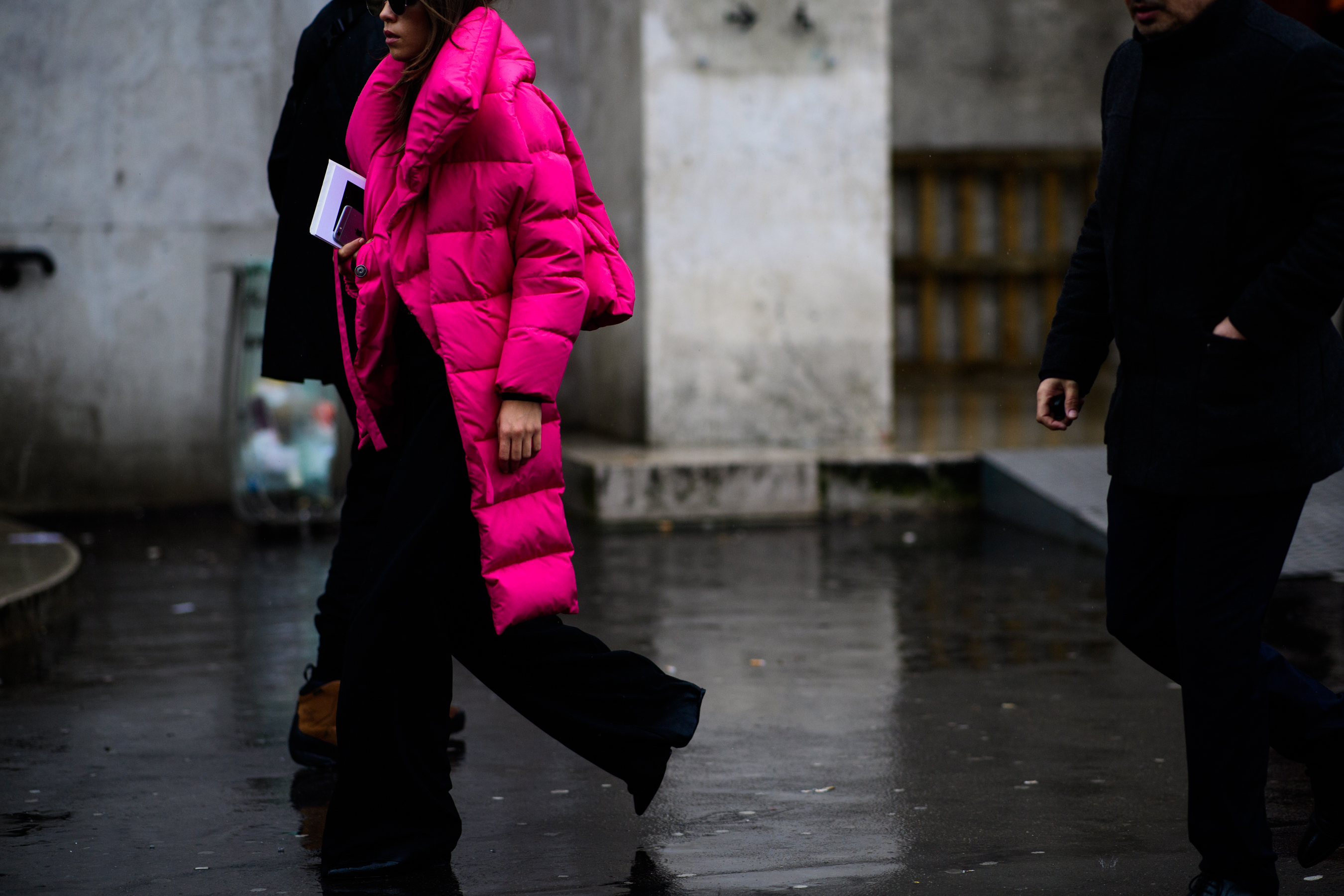 Italian woman wearing pink puffer jacket