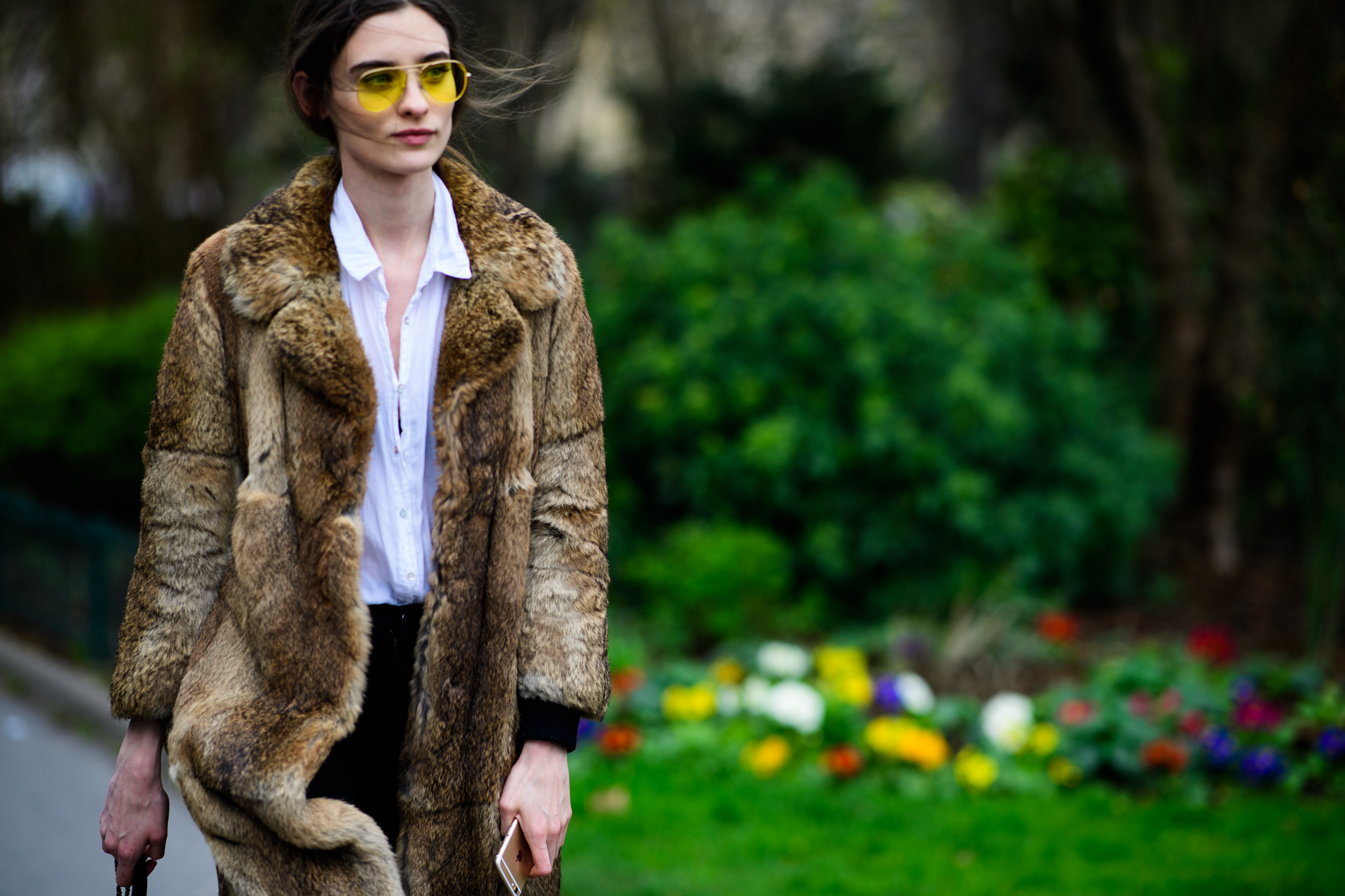 Model wearing yellow sun glasses