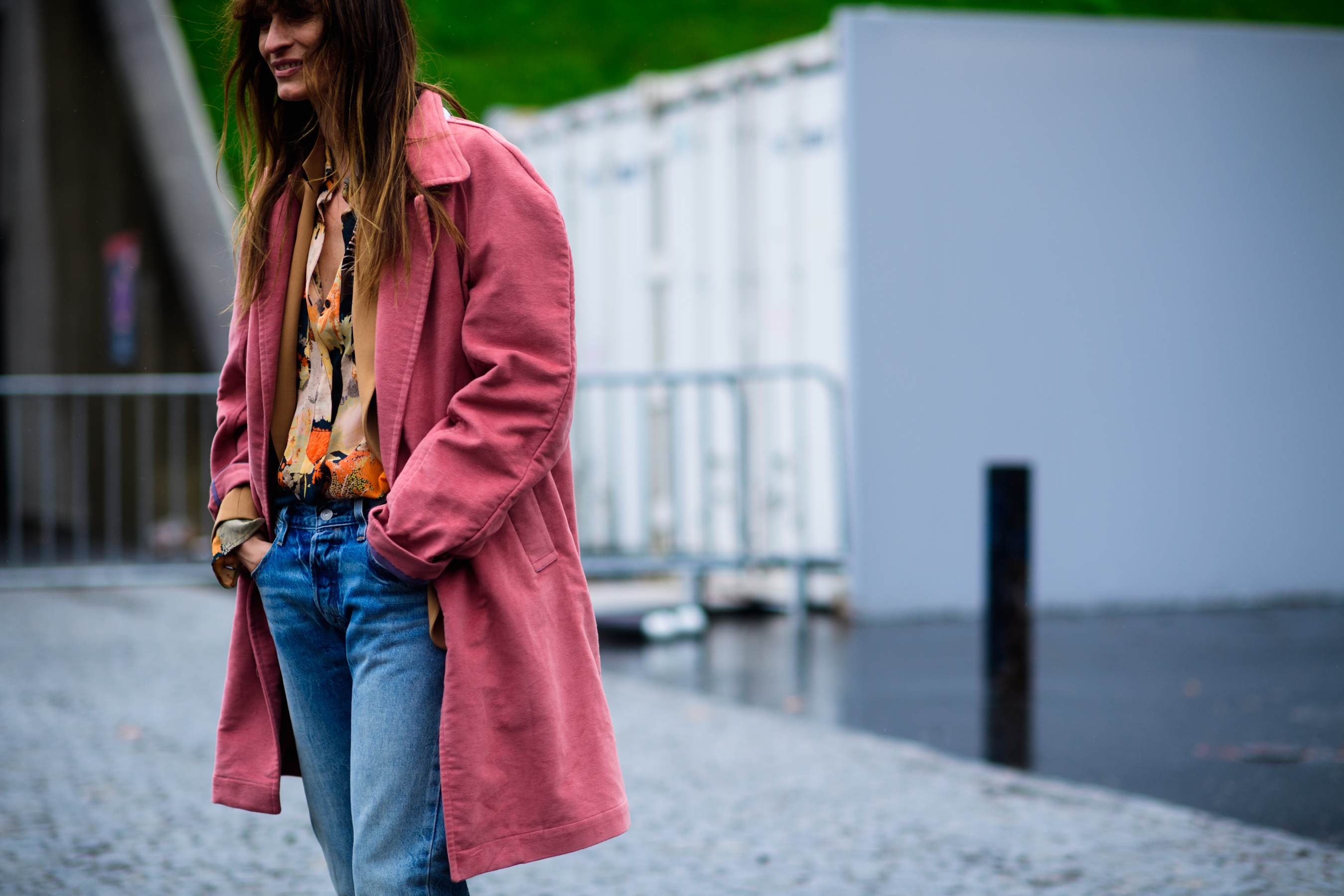Top French model wearing pink coat